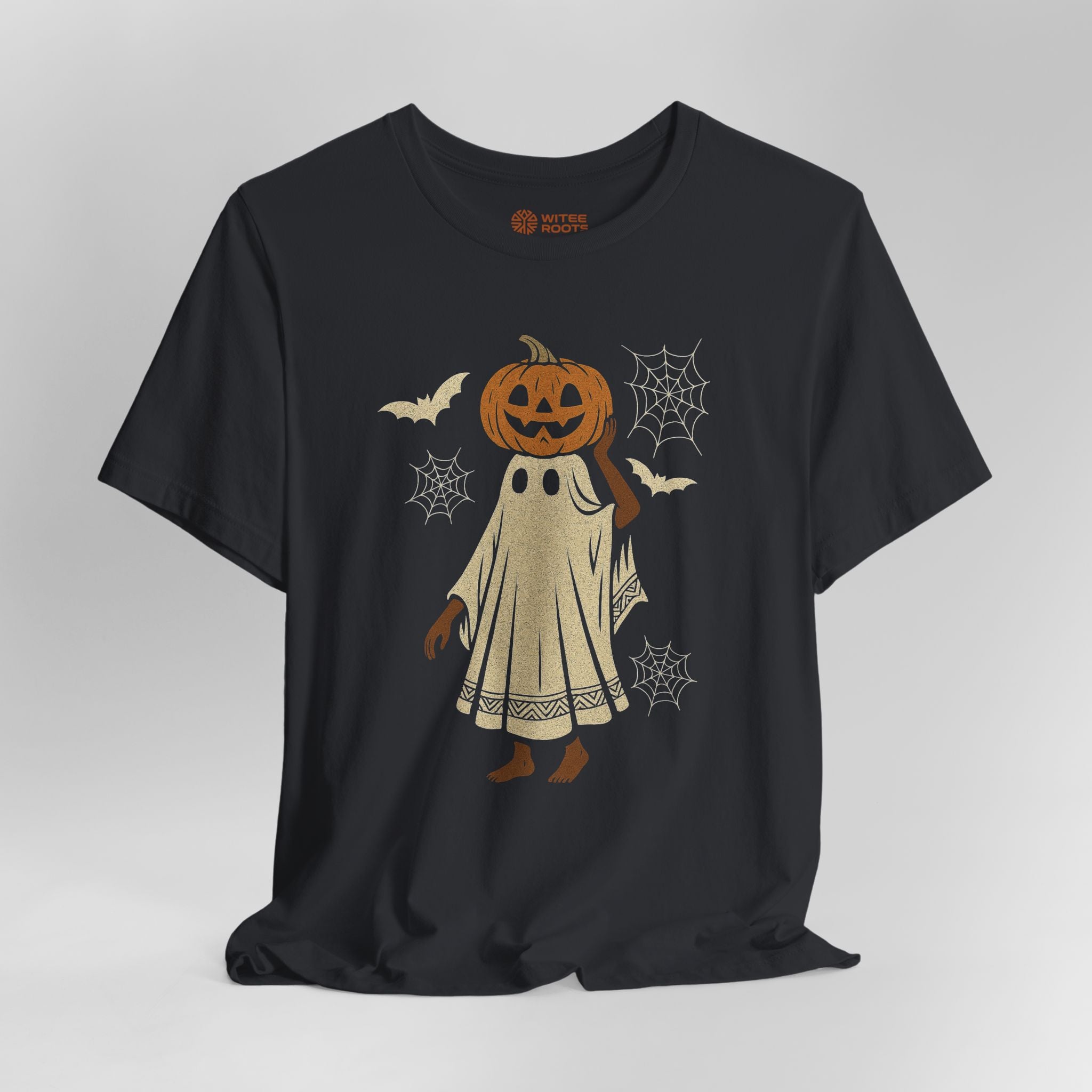 A black short-sleeve t-shirt with a Halloween graphic of a ghost character wearing a jack-o'-lantern head, surrounded by bats, spiderwebs, and cobwebs. The brand name 'BLOOMIGHT' is printed inside the collar.