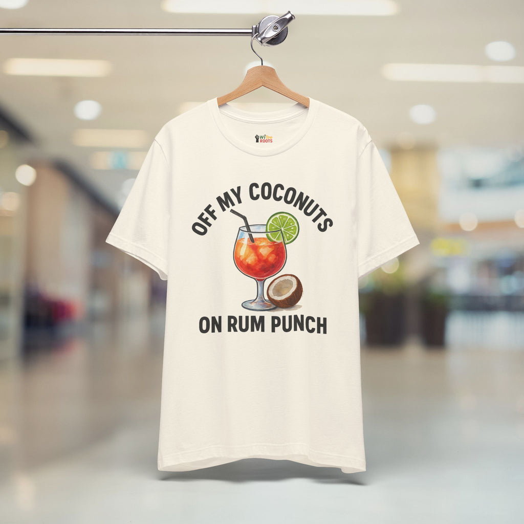 Beige t-shirt with a graphic design and text on a hanger in a store setting