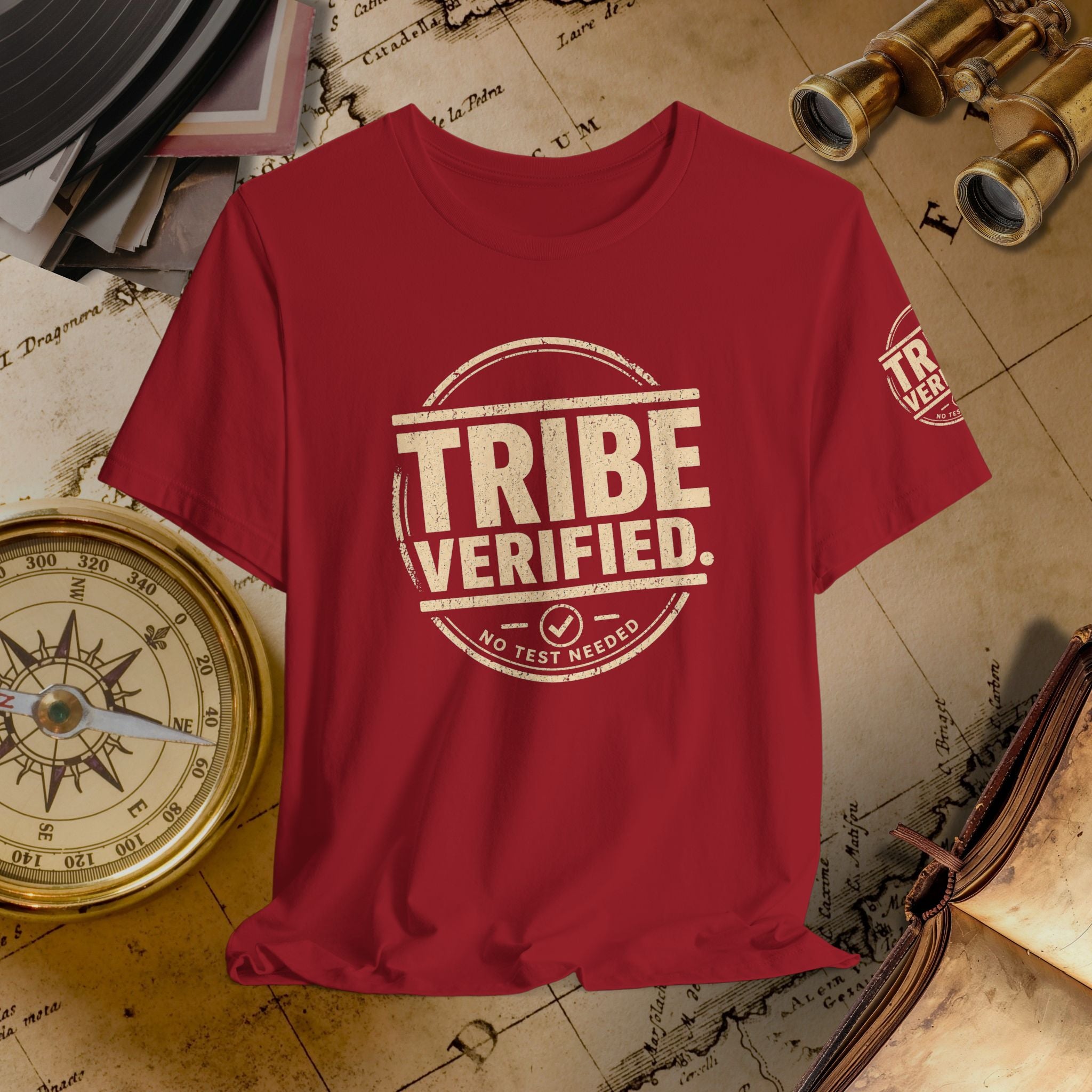 Red t-shirt with 'TRIBE VERIFIED' text on a vintage map background