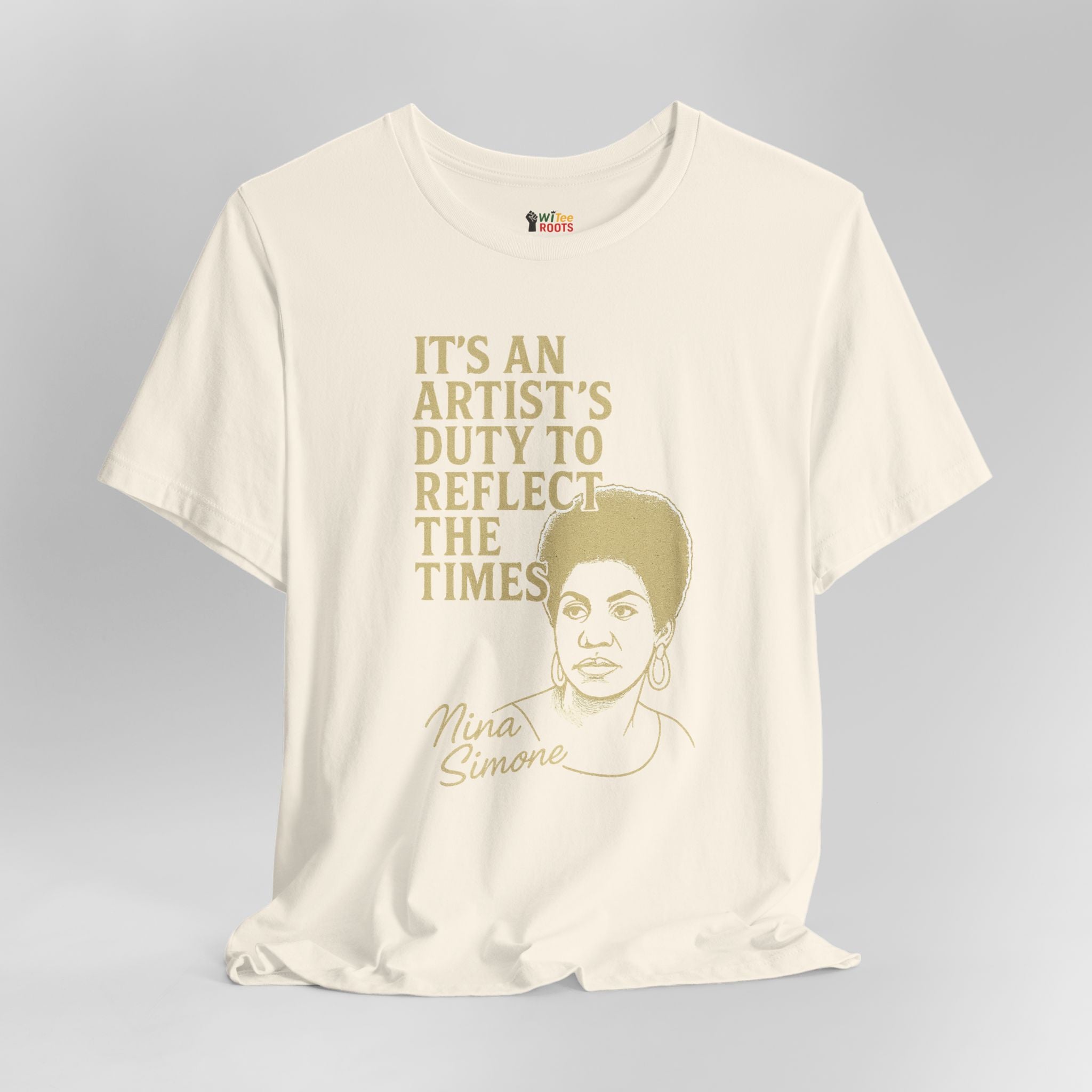 Beige t-shirt with gold text and Nina Simone graphic on a gray background