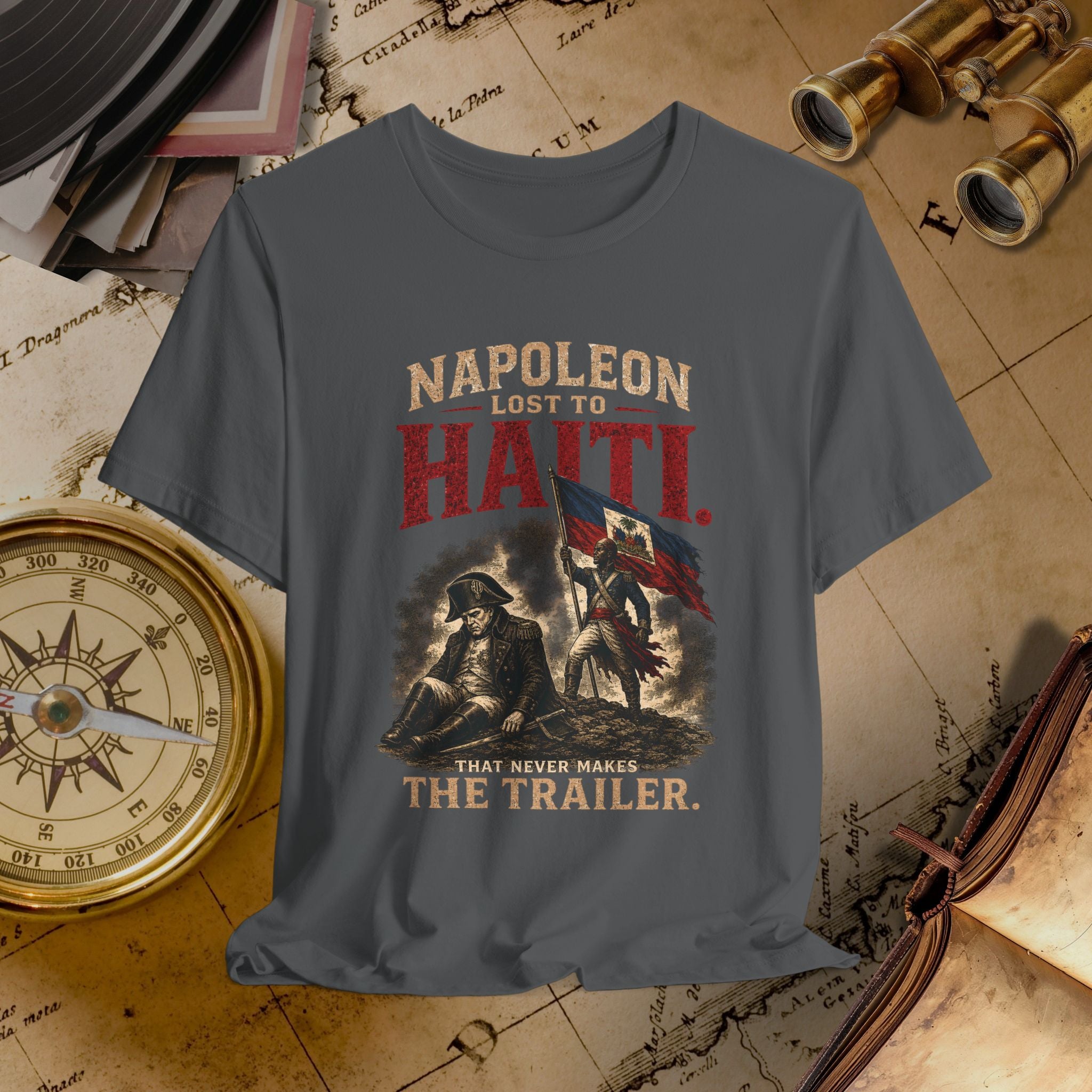 Gray t-shirt with Napoleon graphic and text on a vintage map background