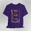 Purple t-shirt with a graphic of a queen and 'Queens Reign' text on a gray background