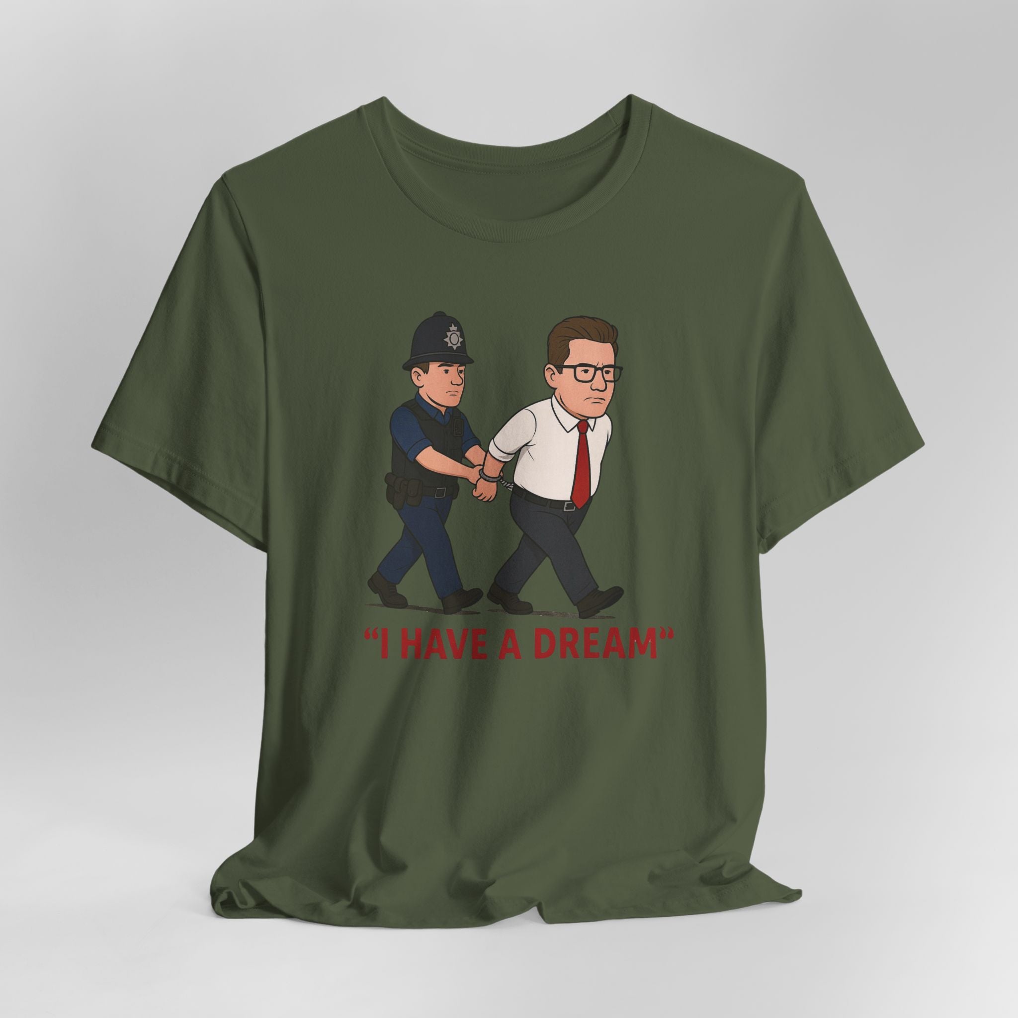 Green t-shirt with a graphic of a police officer and a man being arrested, with 'I HAVE A DREAM' text.