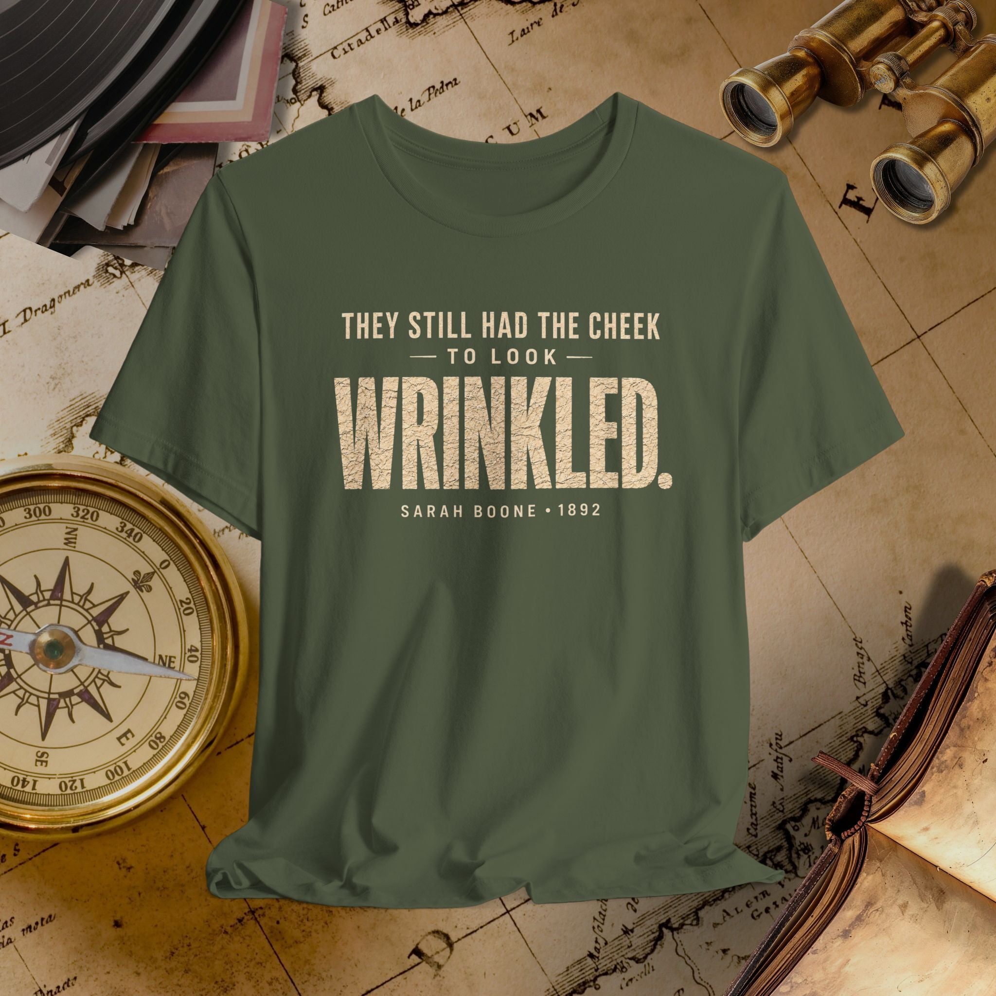 Green t-shirt with text on a vintage map background