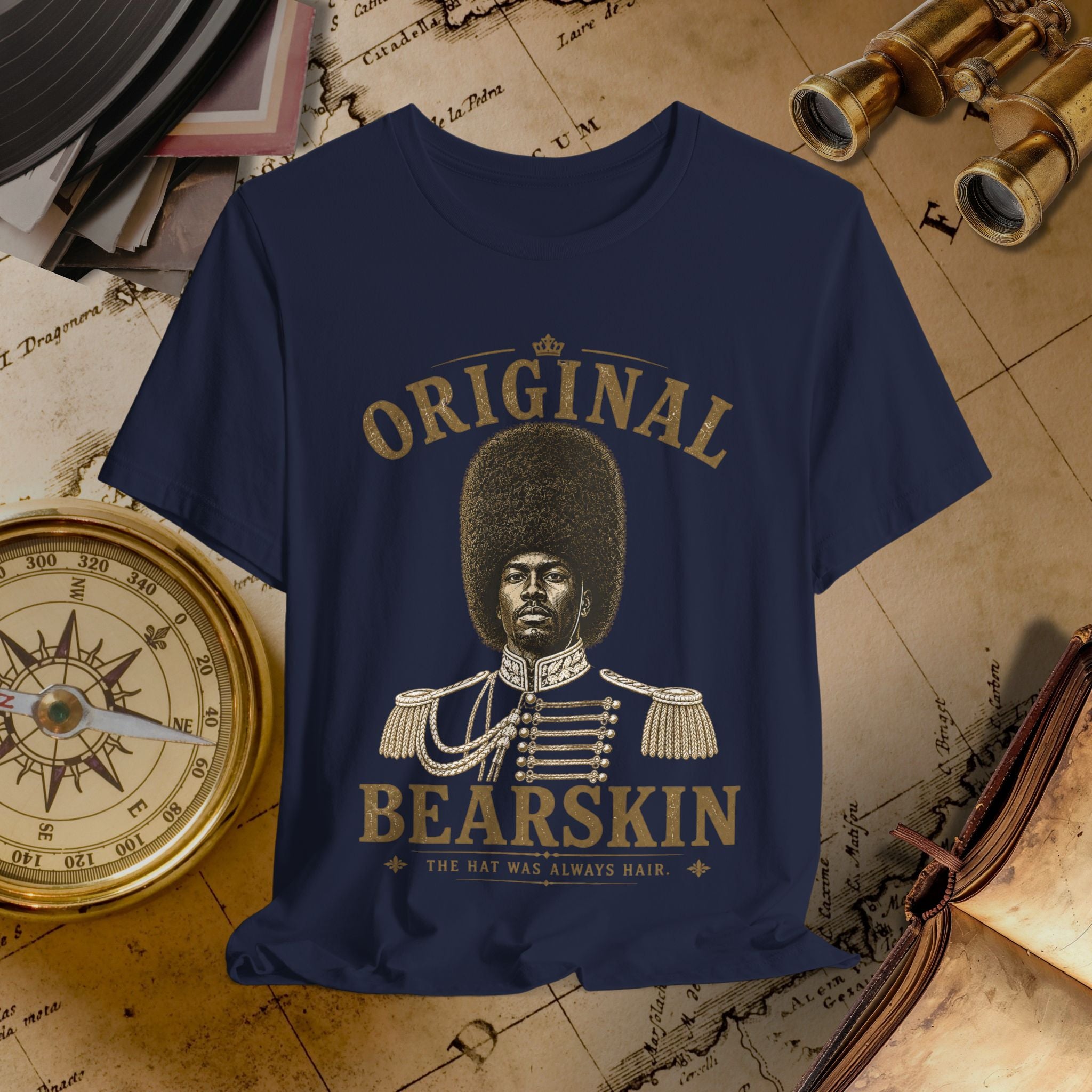 Navy blue t-shirt with a graphic of a person in uniform and text 'Original Bearskin' on an old map background.