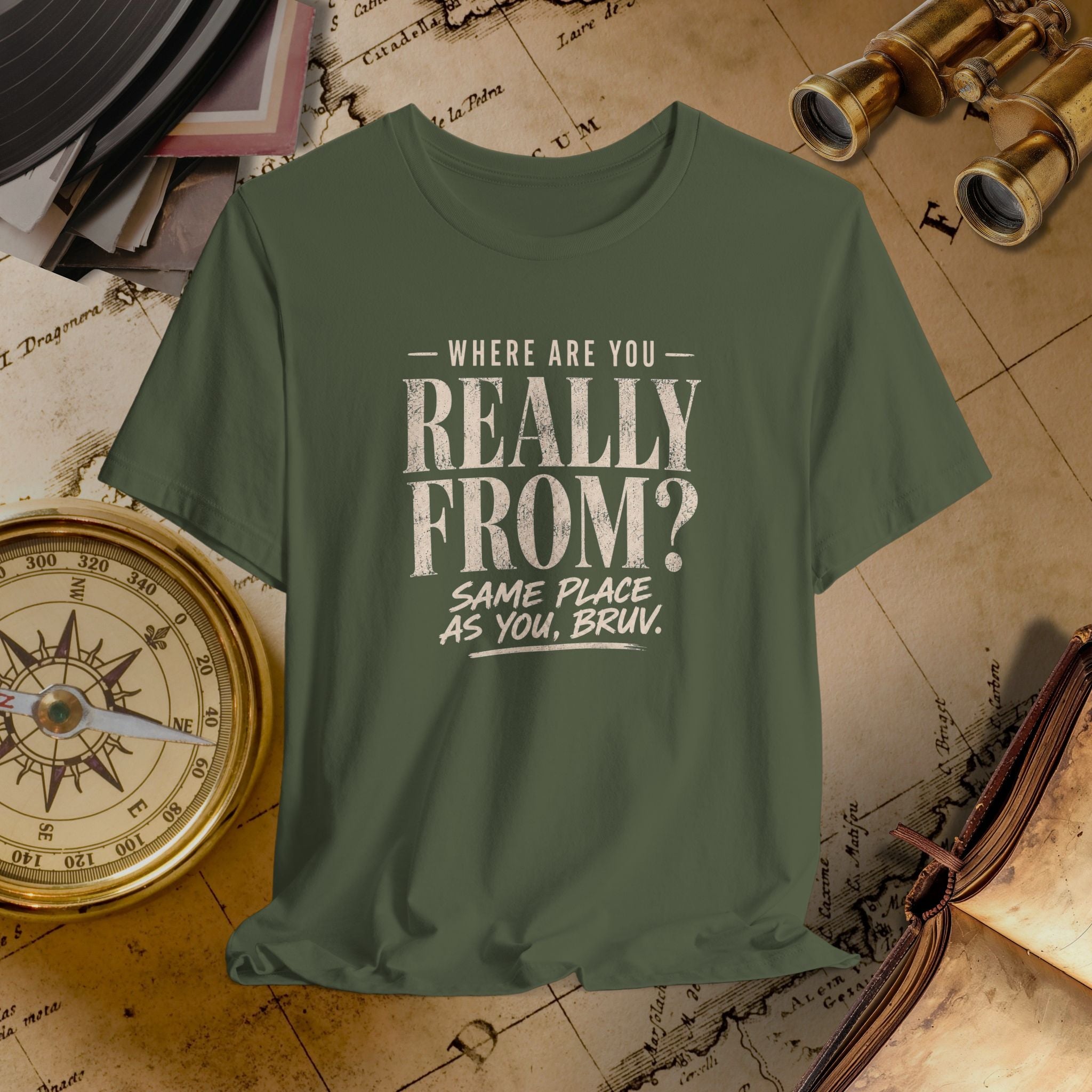 Green t-shirt with humorous text on a vintage map background