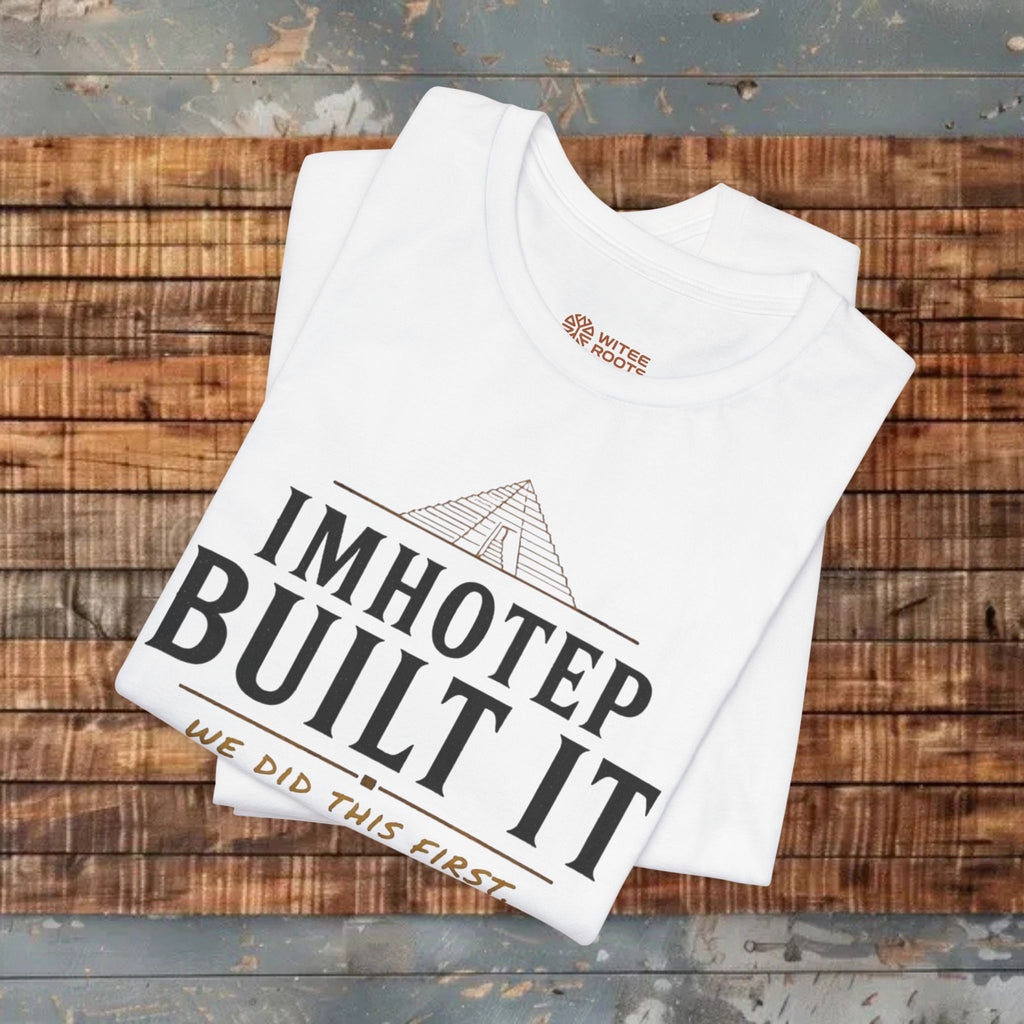 White tank top with 'IMHOTEP BUILT IT' text on a wooden surface
