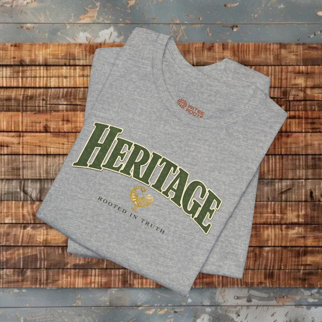 Gray t-shirt with 'Heritage' text on a wooden surface
