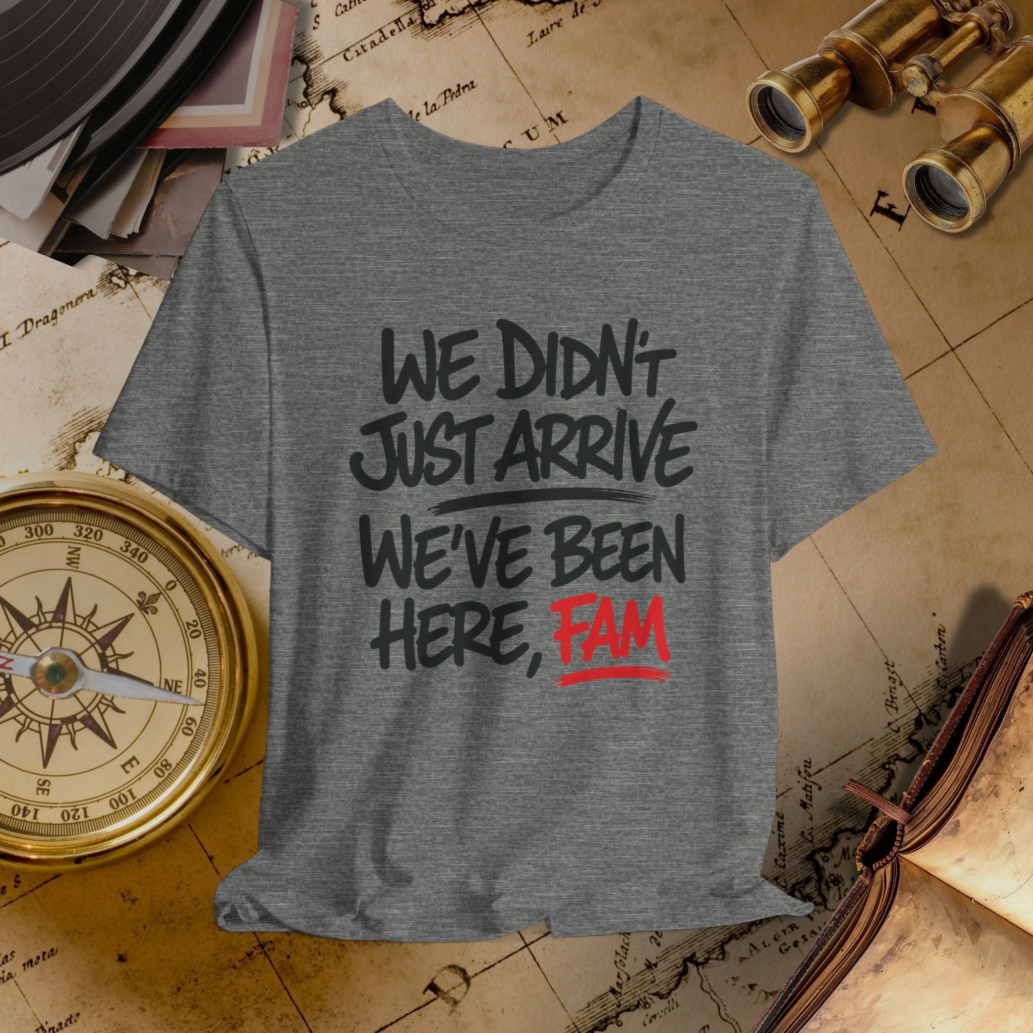 Gray t-shirt with humorous text on a vintage map background