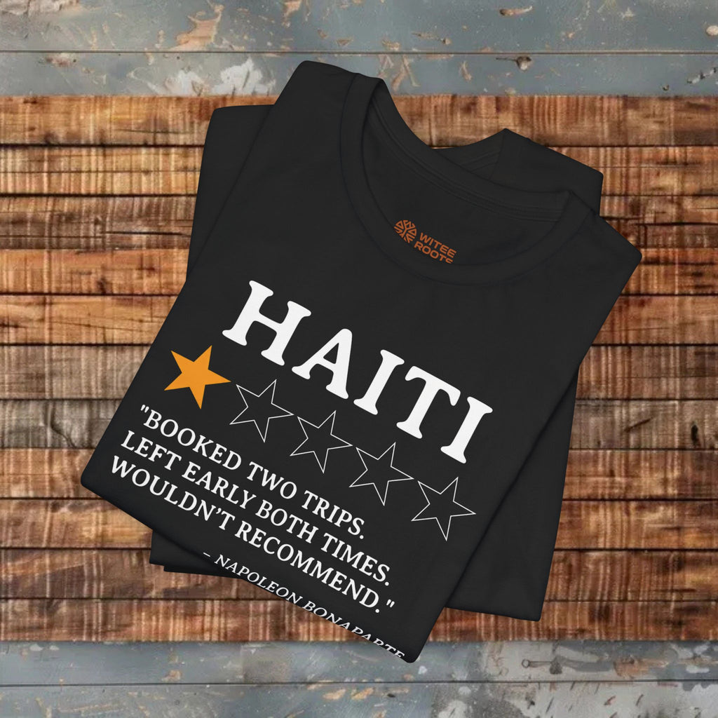 Black t-shirt with Haiti text and star rating on a wooden surface