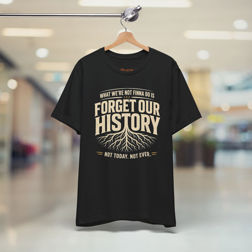 Black t-shirt with a printed message on a hanger in a store setting