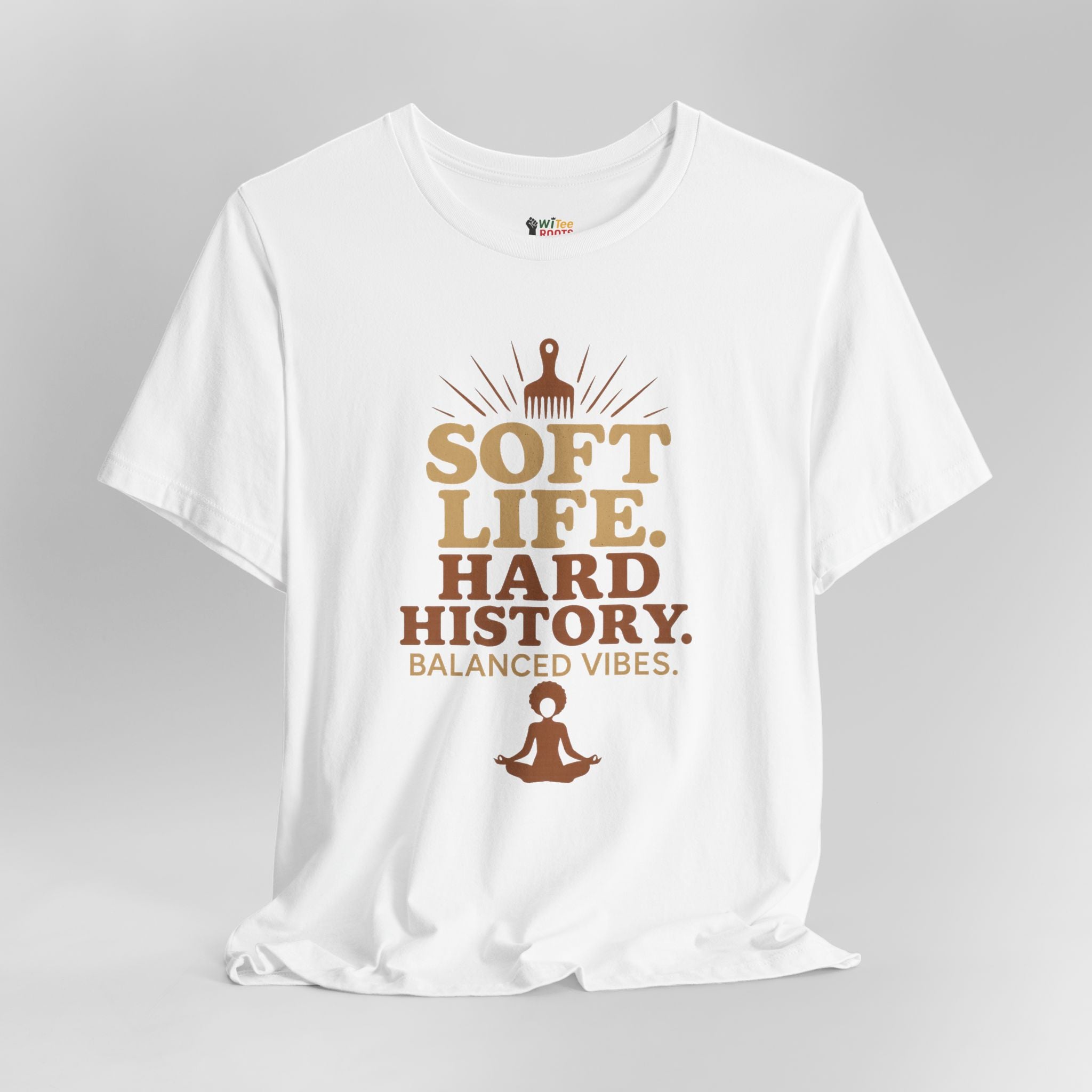White t-shirt with brown text and graphics on a gray background