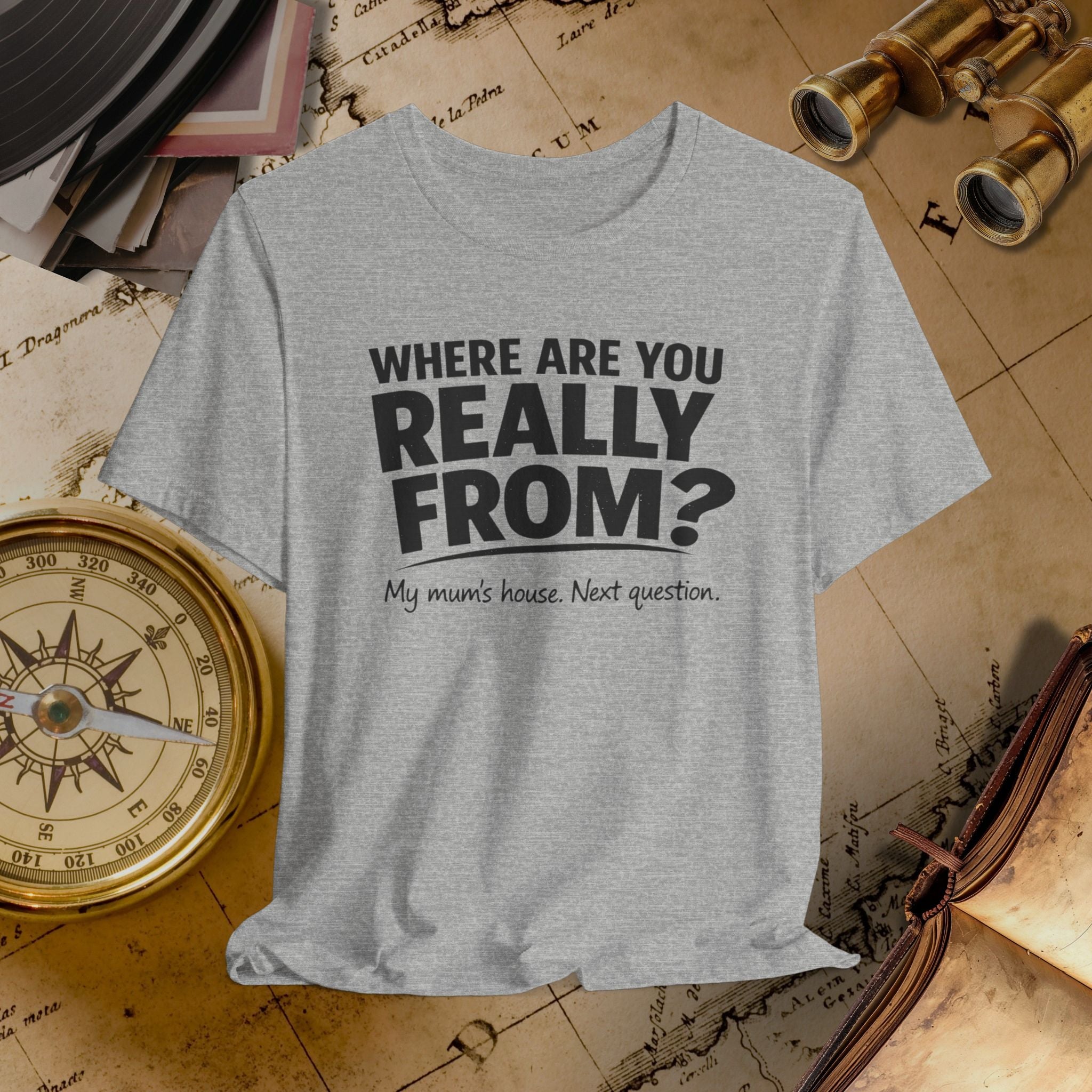 Gray t-shirt with humorous text on a vintage map background