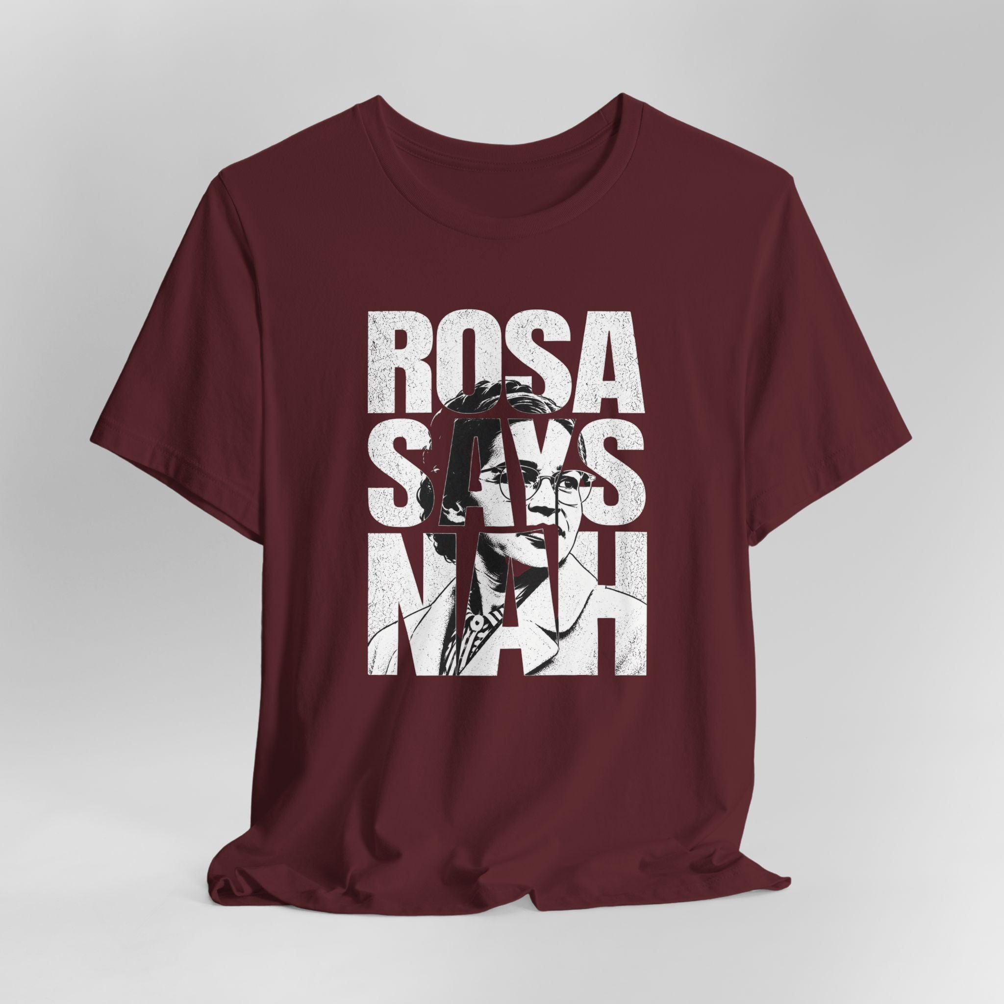 Maroon t-shirt with 'Rosa Parks' graphic and text on a white background