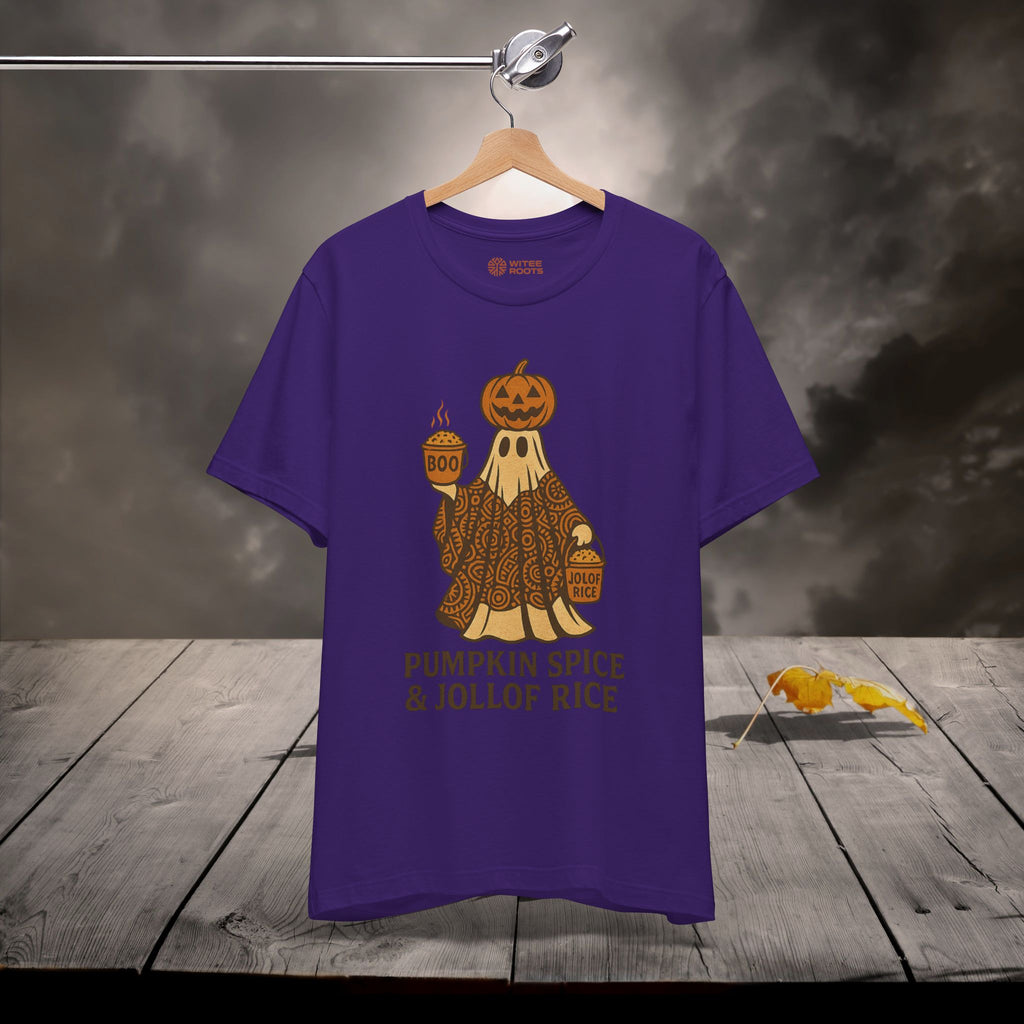 Purple t-shirt with Halloween-themed design on a wooden surface
