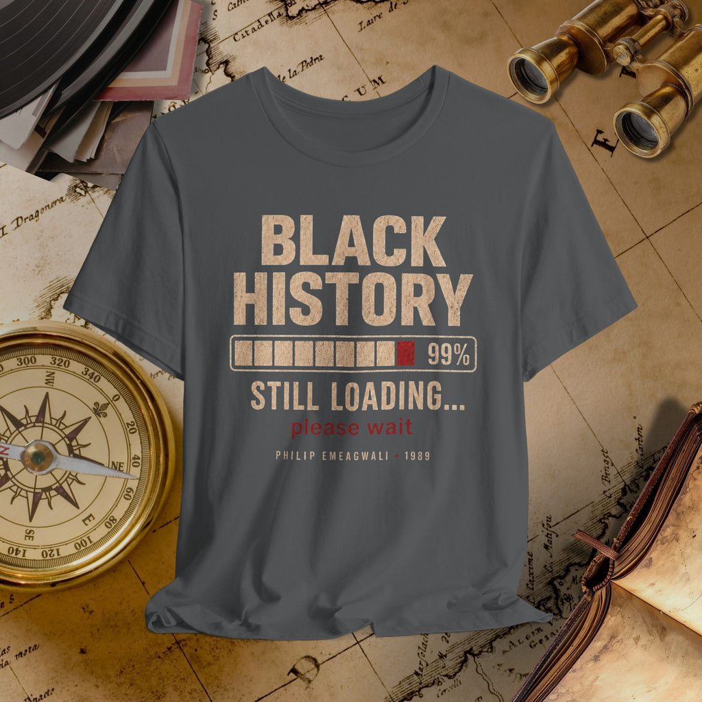 Gray t-shirt with 'Black History Still Loading' text on a vintage map background