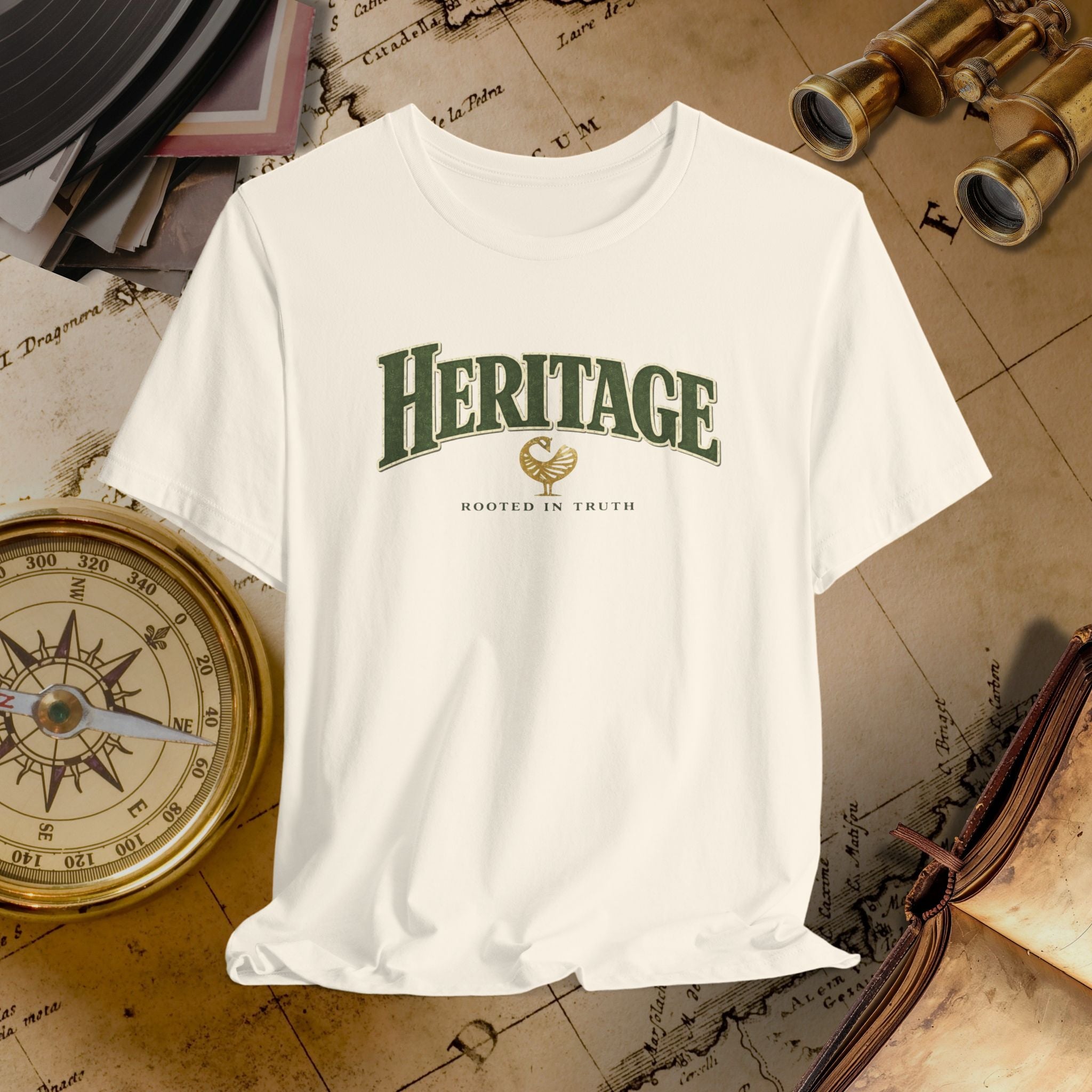 Beige t-shirt with 'Heritage' text on a vintage map background