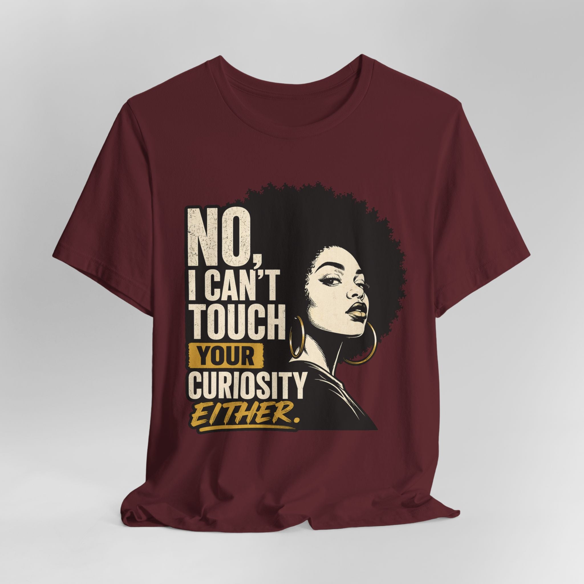 Maroon t-shirt with graphic of a woman and text on a white background