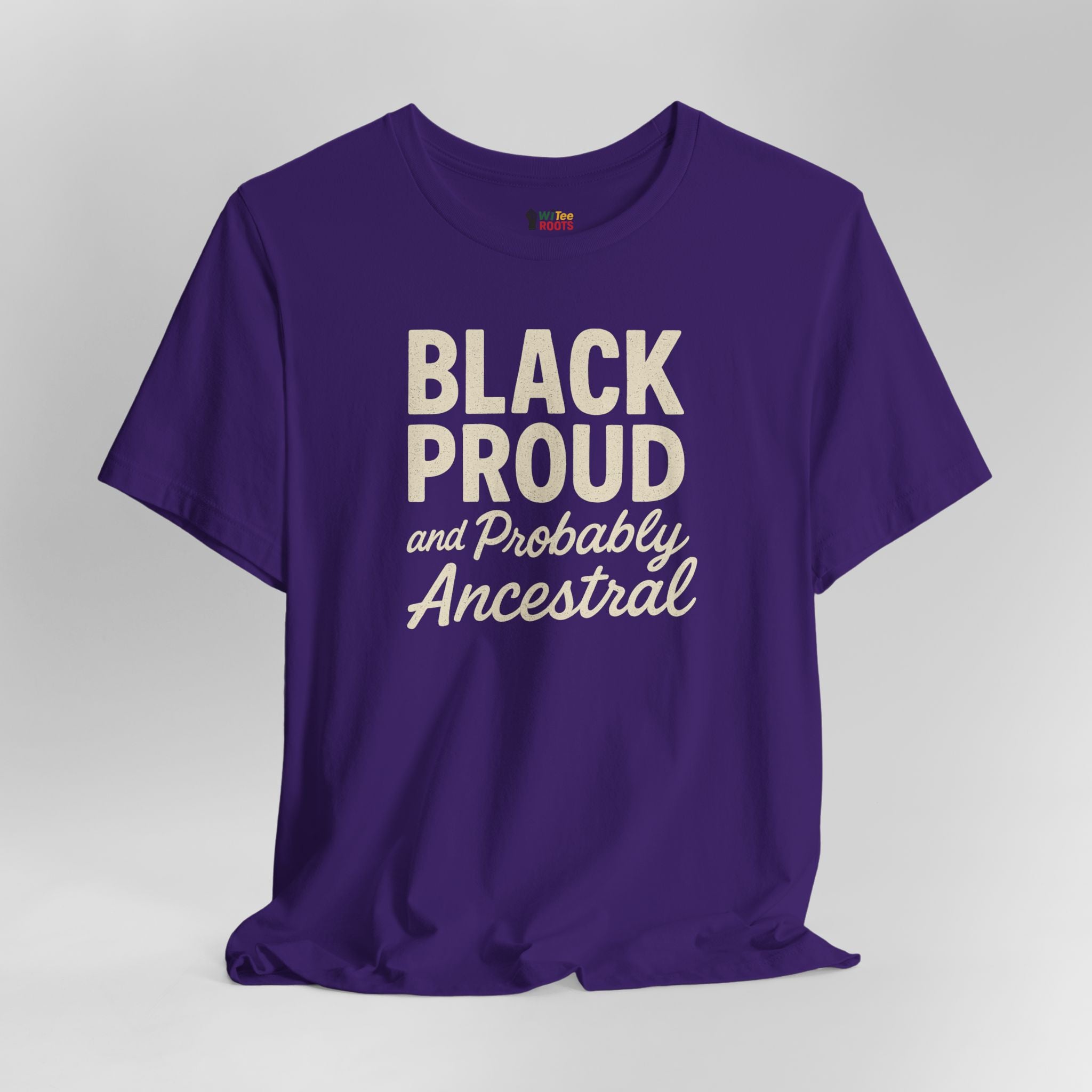 Purple t-shirt with 'Black Proud and Probably Ancestral' text on a gray background