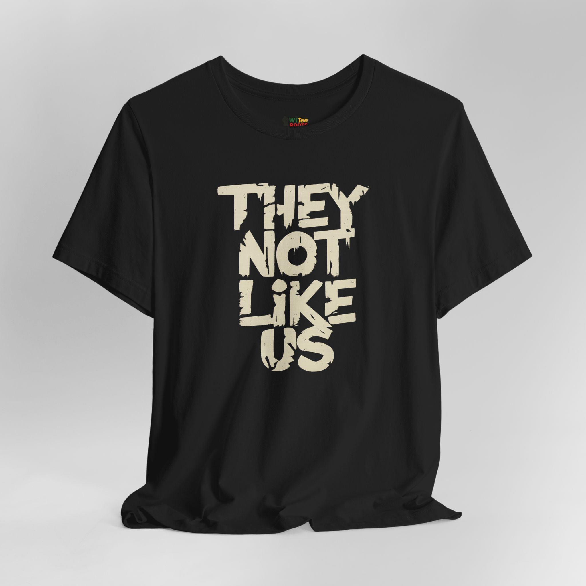 Black t-shirt with 'THEY NOT LIKE US' text on a gray background