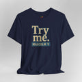 Navy blue t-shirt with 'Try me. MALCOLM X' text on a gray background
