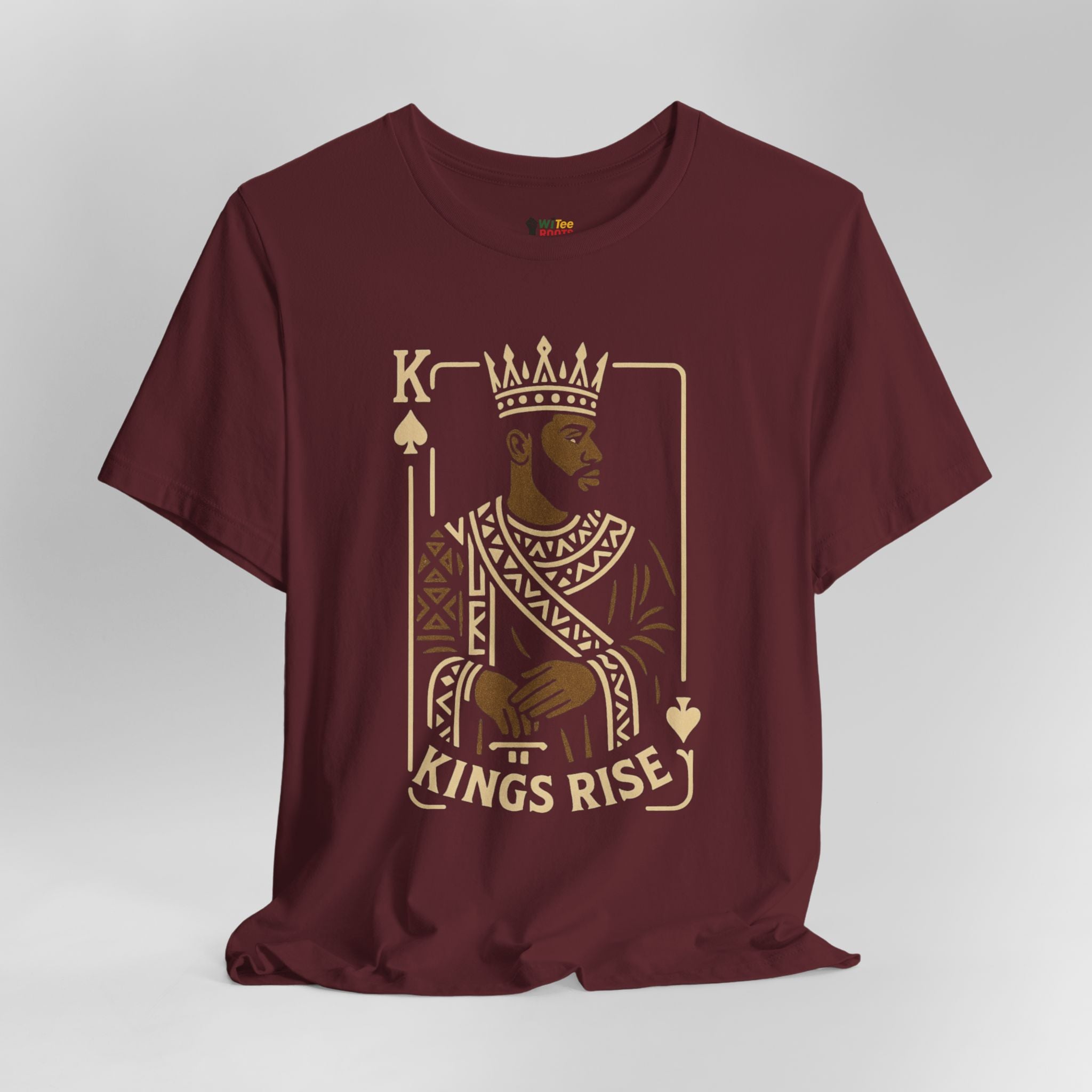 Maroon t-shirt with a graphic design of a king and 'Kings Rise' text on a white background