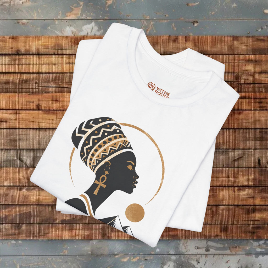 White tank top with a graphic design of a woman's profile on a wooden surface