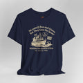 Navy blue t-shirt with white text and graphics on a gray background