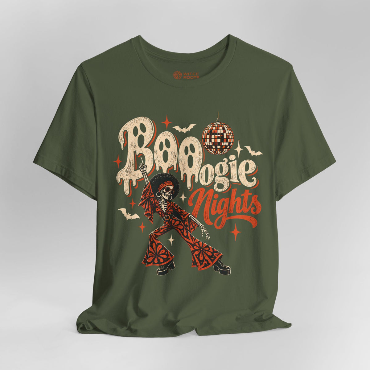 An olive green short-sleeve t-shirt with a 'Boogie Nights' Halloween graphic on the front, featuring a skeleton in a red patterned suit, a disco ball, and skulls, displayed on a neutral gray background.