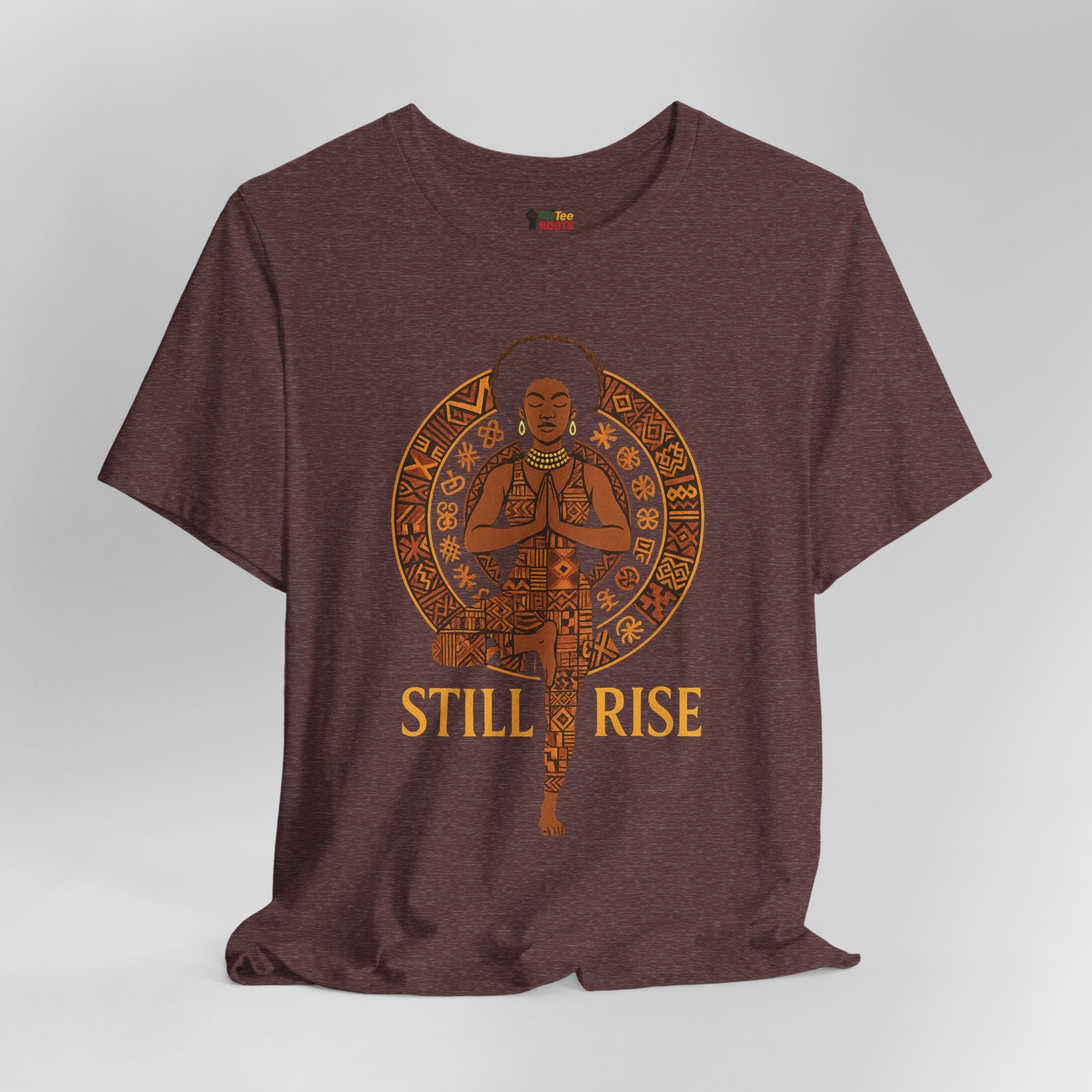 Maroon t-shirt with a graphic design and 'STILL RISE' text on a gray background
