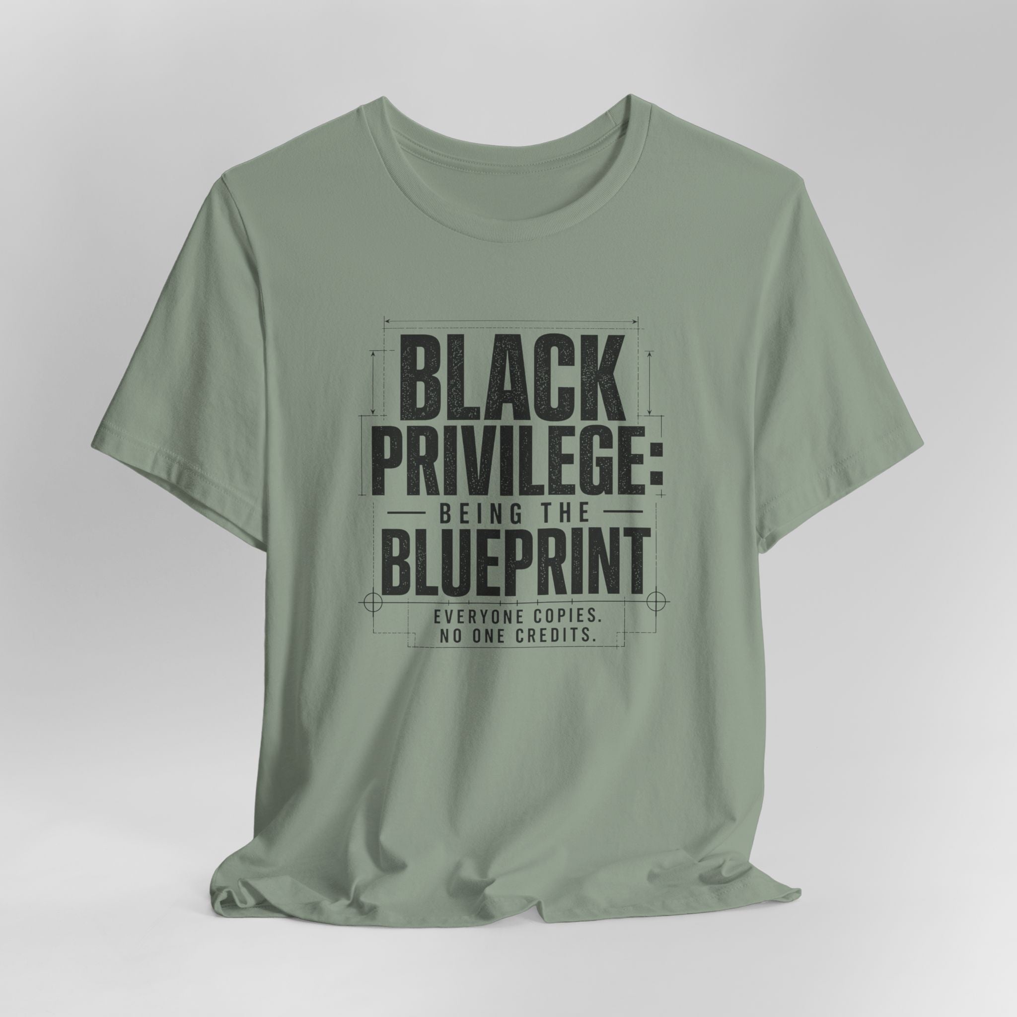 Green t-shirt with black text on a white background