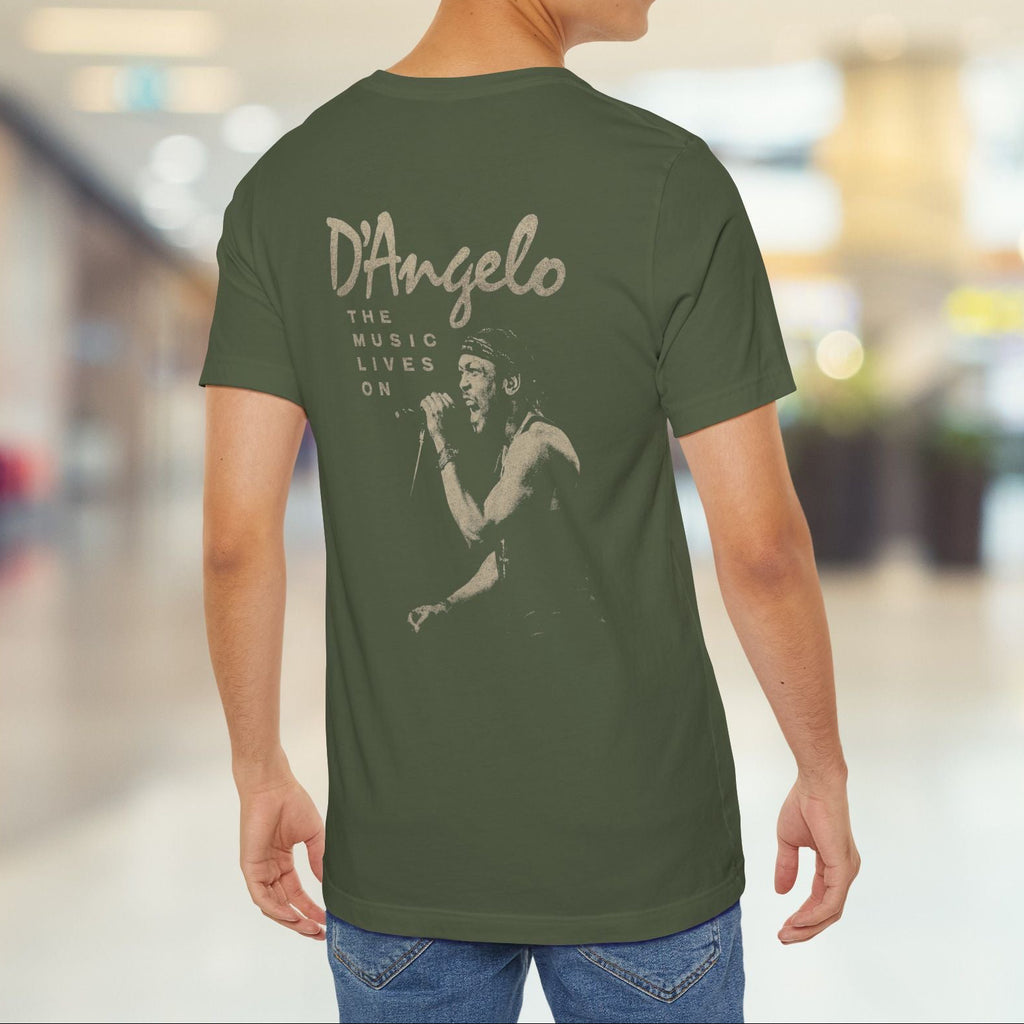 Person wearing a green t-shirt with 'D'Angelo' design in a mall setting