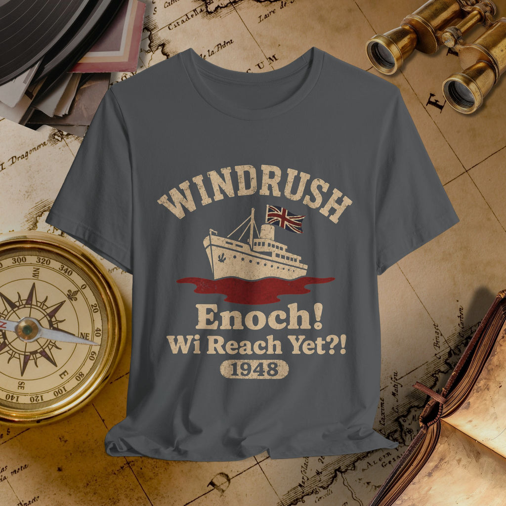 T-shirt with 'Windrush Enoch! Wi Reach Yet?! 1948' design on a vintage map background