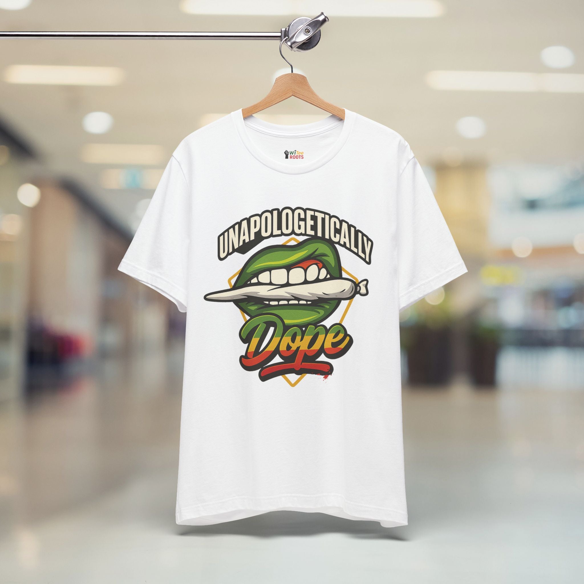 White t-shirt with colorful graphic design on a hanger in a mall setting