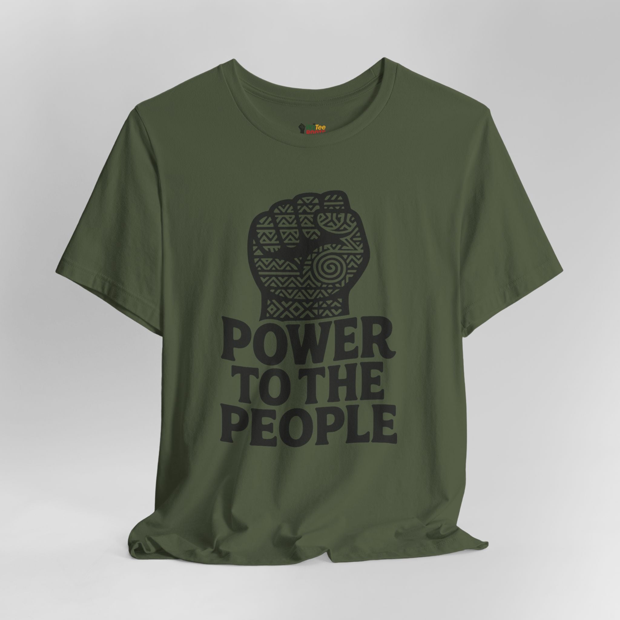 Green t-shirt with a graphic of a raised fist and 'Power to the People' text on a gray background