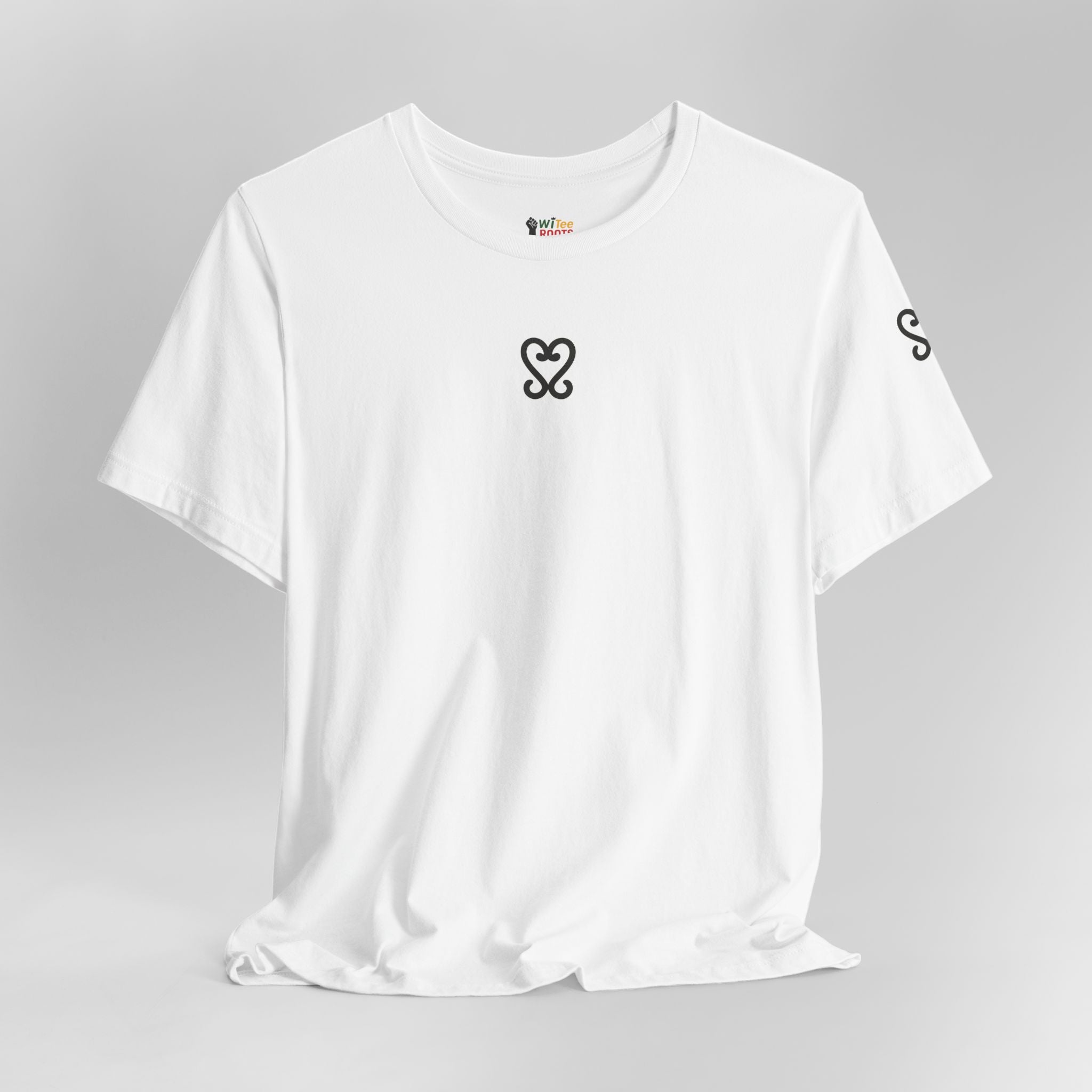 White t-shirt with black heart and circle design on a gray background