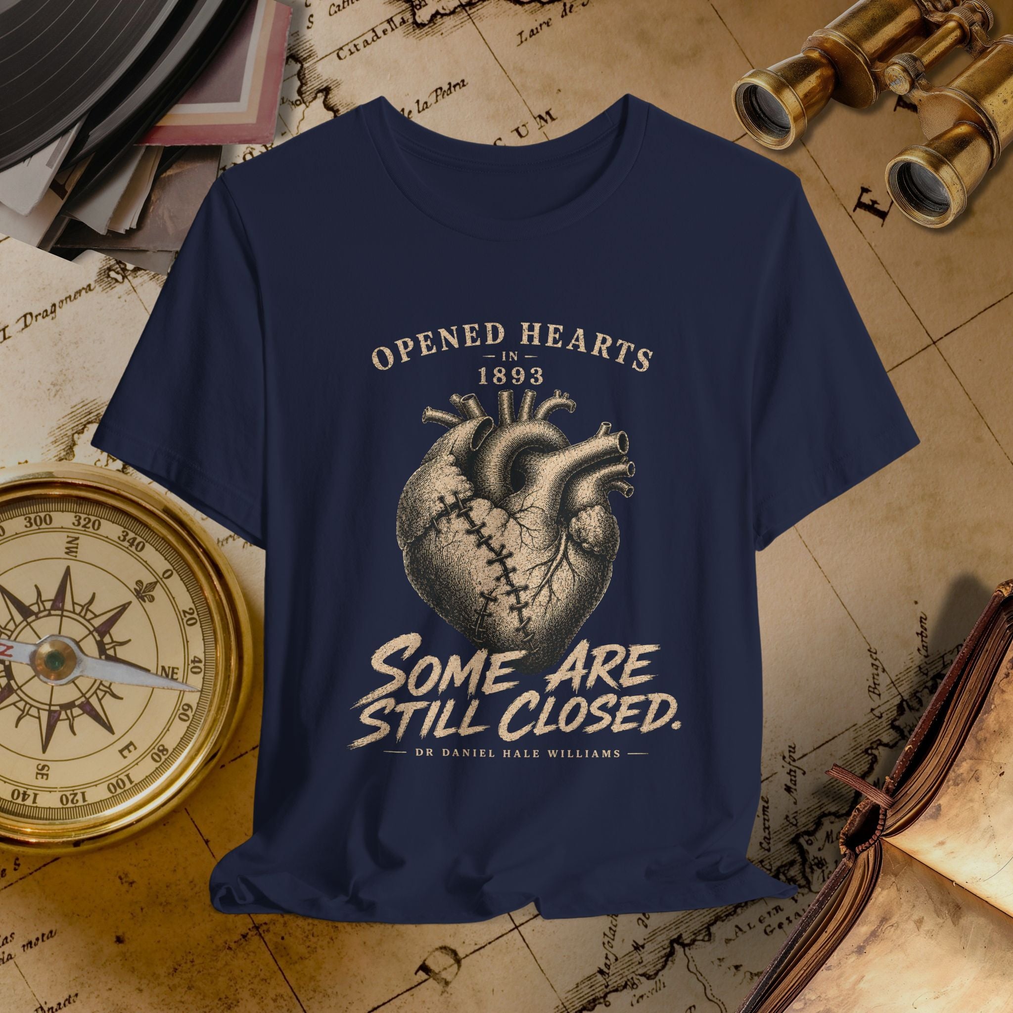Navy blue t-shirt with heart design and text on a vintage map background