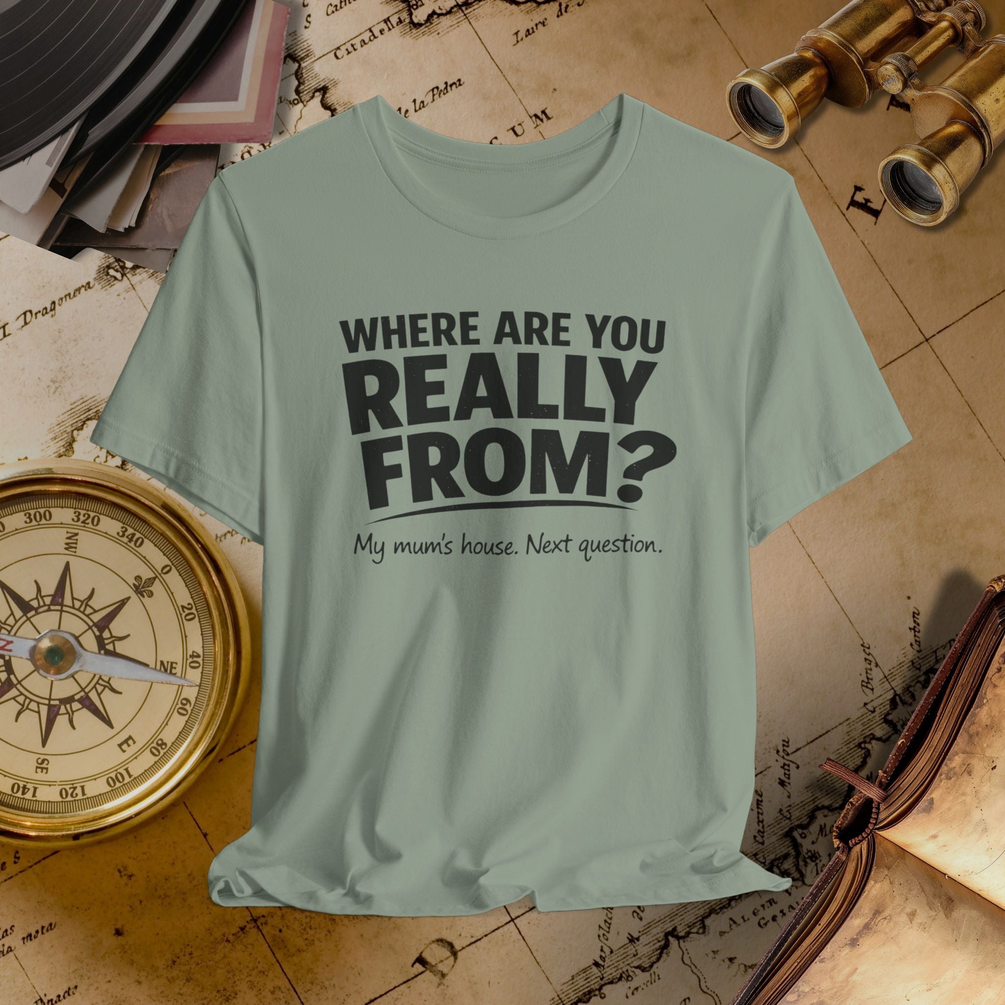 Light green t-shirt with text on a vintage map background