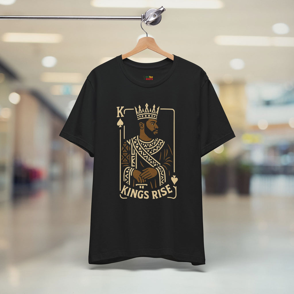 Black t-shirt with 'Kings Rise' graphic design on a hanger in a store.