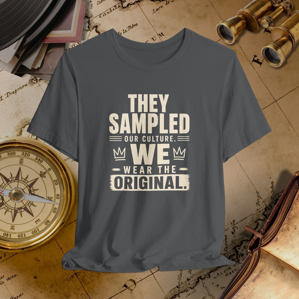 Dark grey t-shirt with white text on a vintage map background