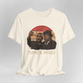  Beige t-shirt with graphic of two men and 'Tupac & Biggie' text on a gray background