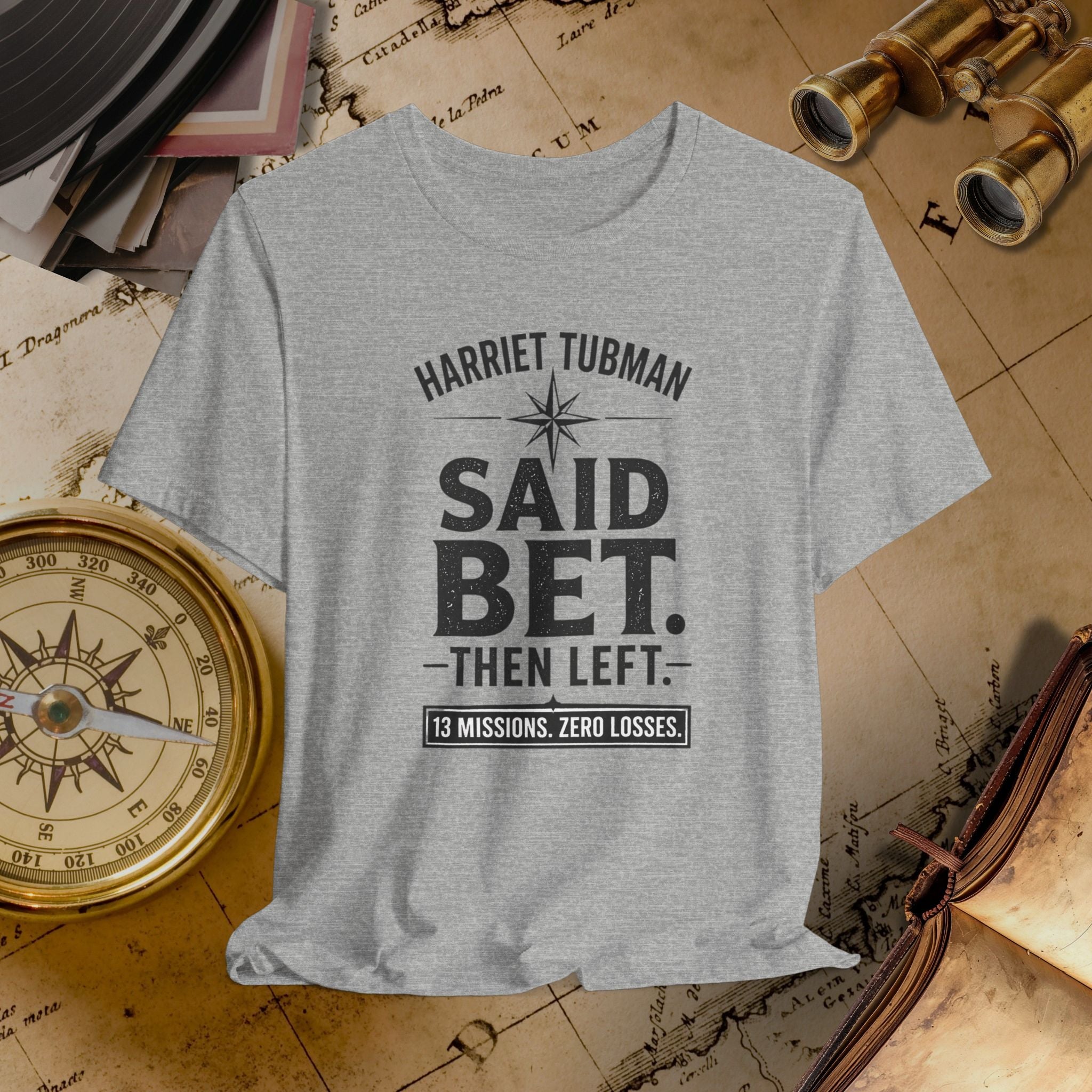 Gray t-shirt with text on a vintage map background