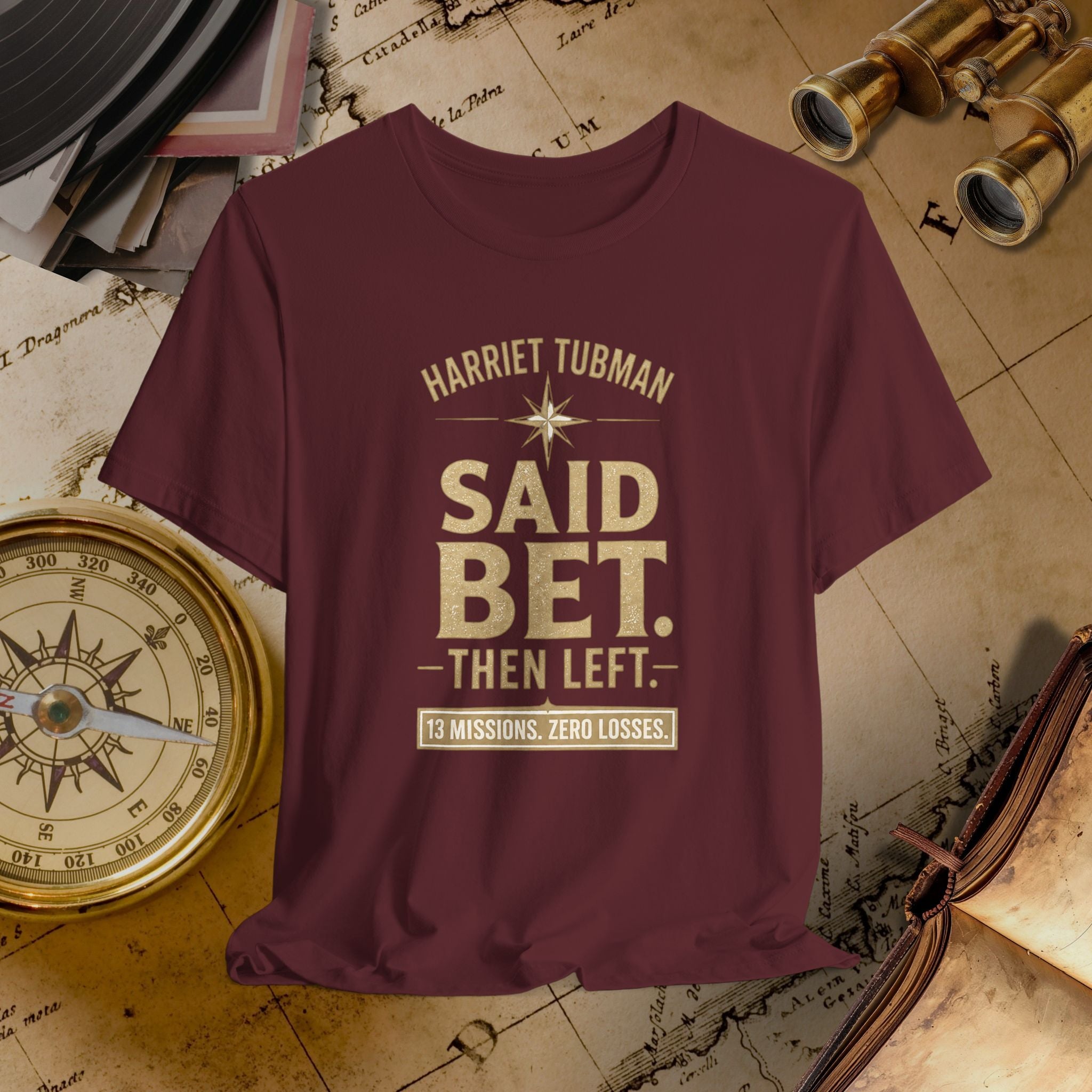 Maroon t-shirt with text on a vintage map background