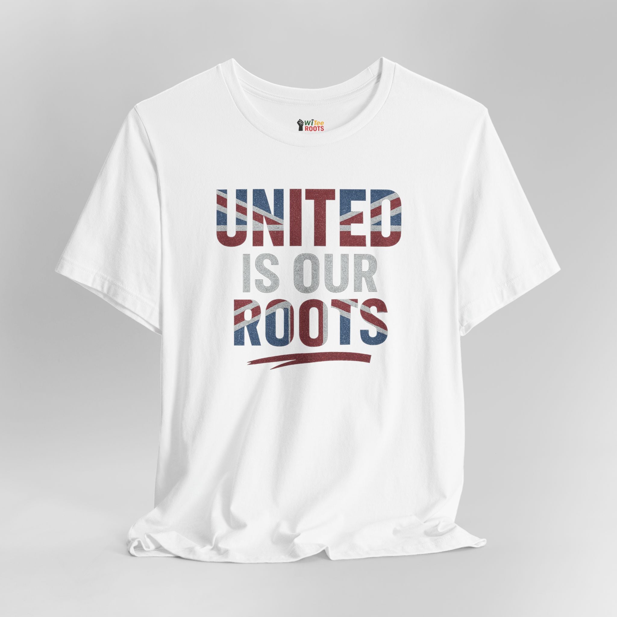 White t-shirt with 'UNITED IS OUR ROOTS' text on a gray background
