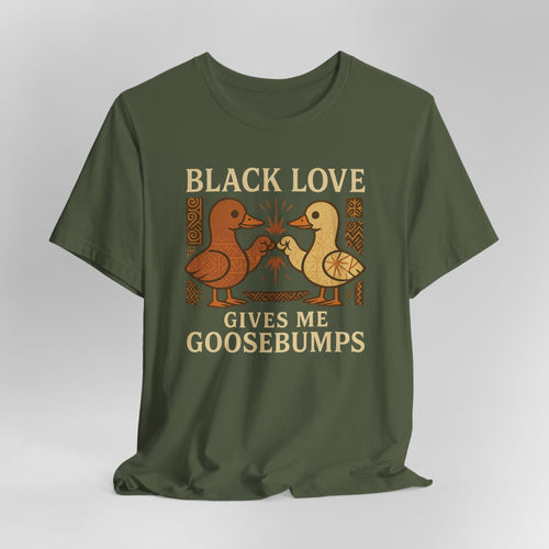 Green t-shirt with 'Black Love Gives Me Goosebumps' text and duck graphics on a white background
