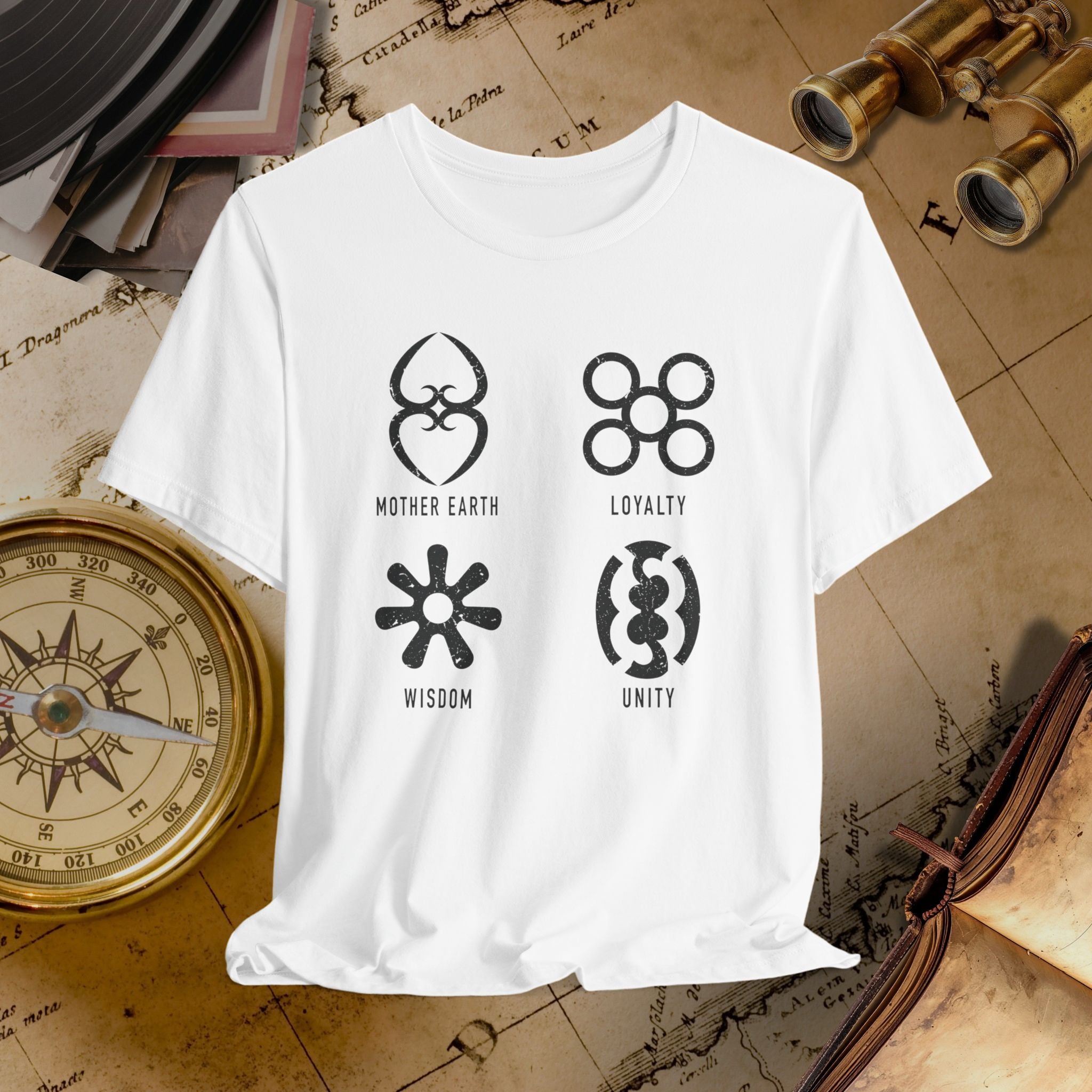 White t-shirt with black symbols and text on a vintage map background