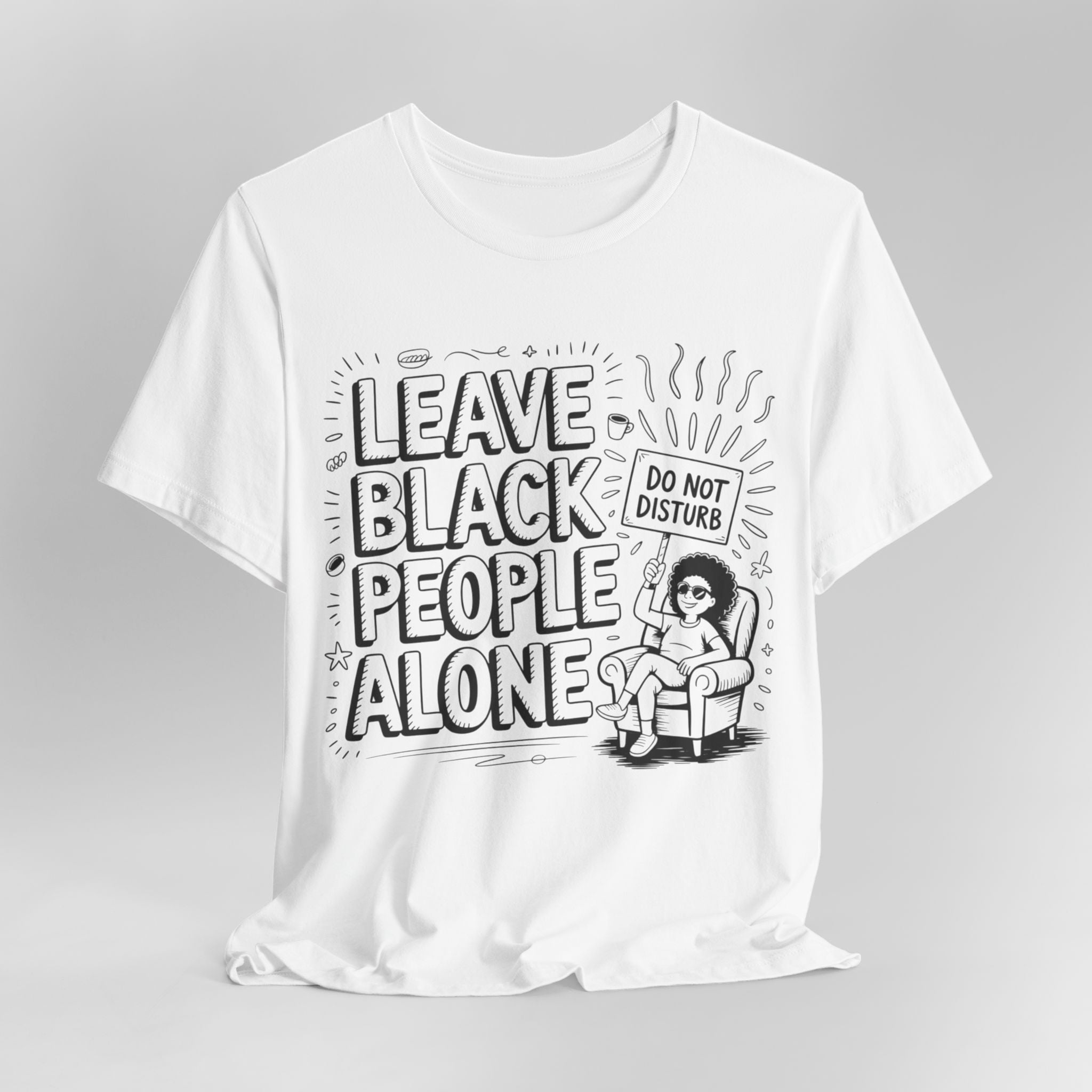 White t-shirt with black text and graphic design on a gray background
