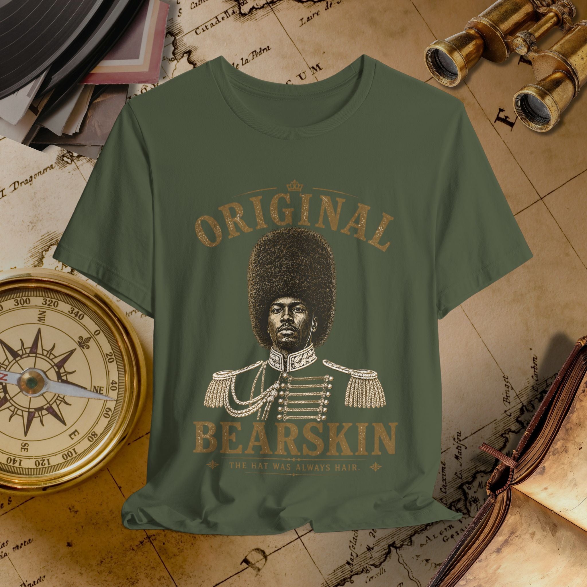 Green t-shirt with a graphic of a person in uniform and text 'Original Bearskin' on a vintage map background.