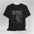 Black t-shirt with 'We Wear the Mask' graphic and text on a white background