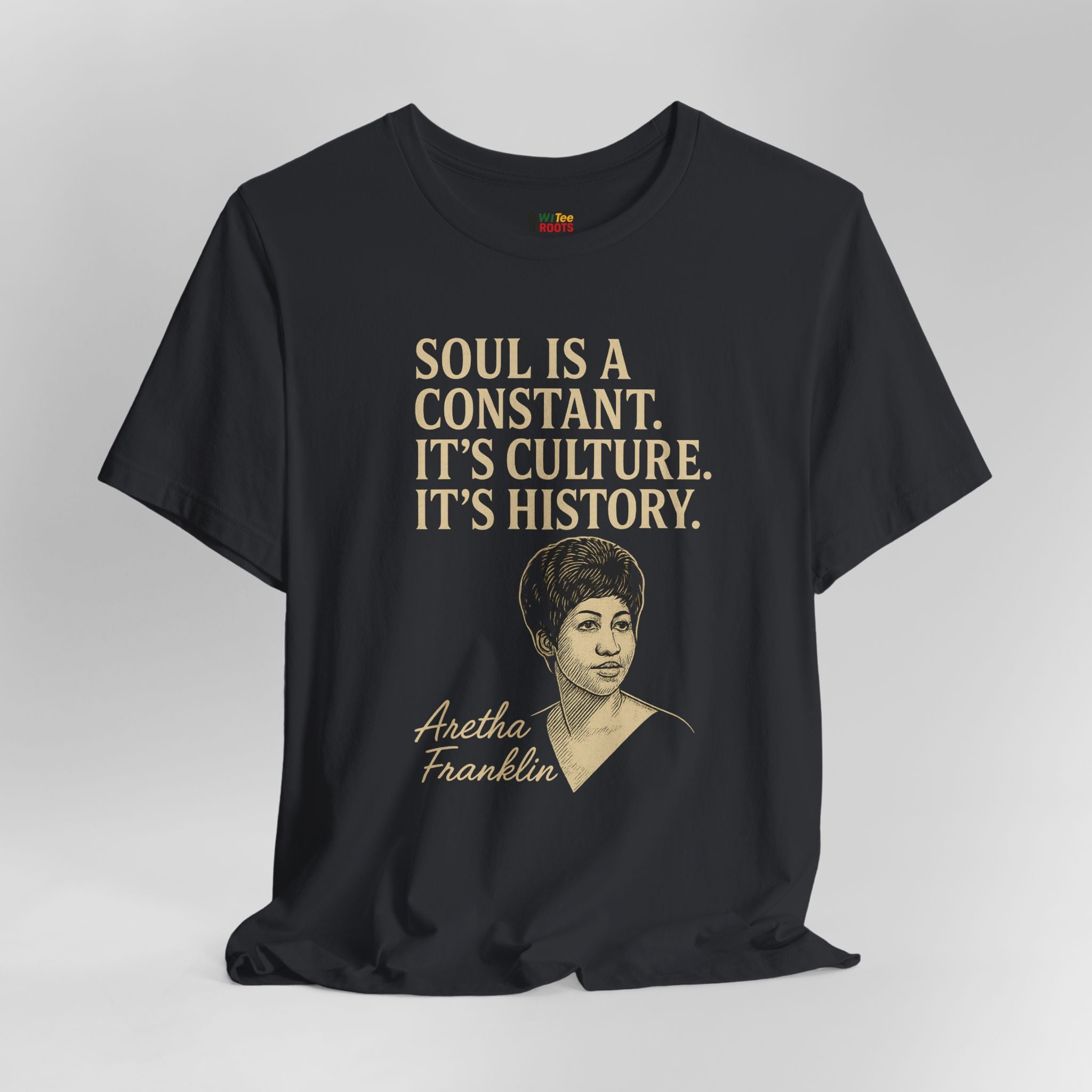 Black t-shirt with a quote and portrait of Aretha Franklin on a gray background